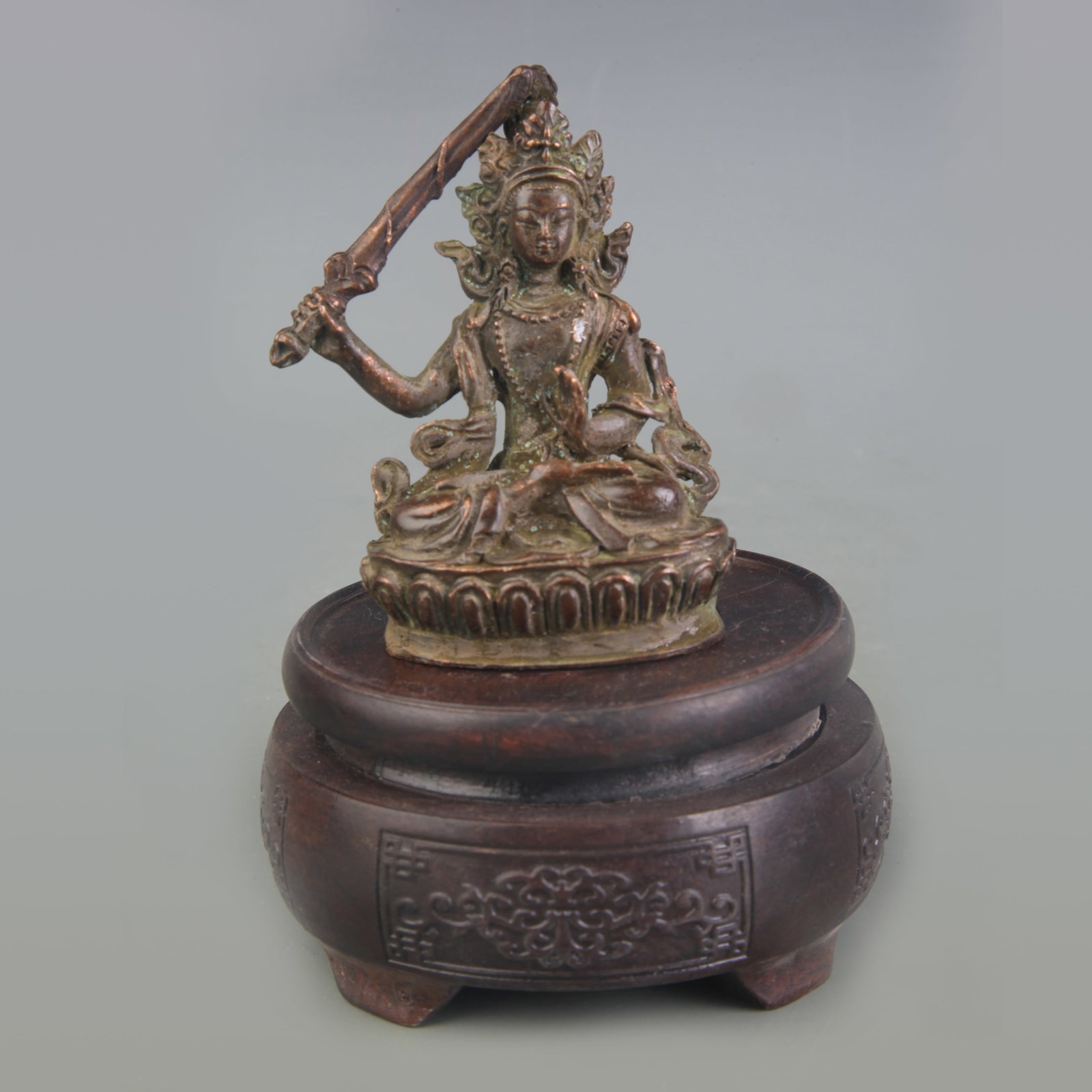 SMALL TIBETAN BRONZE STATUE OF GREEN TARA: Qing Dynasty; Width: 2.2inch, High: 3.2inch; Woodbase for picture and display only