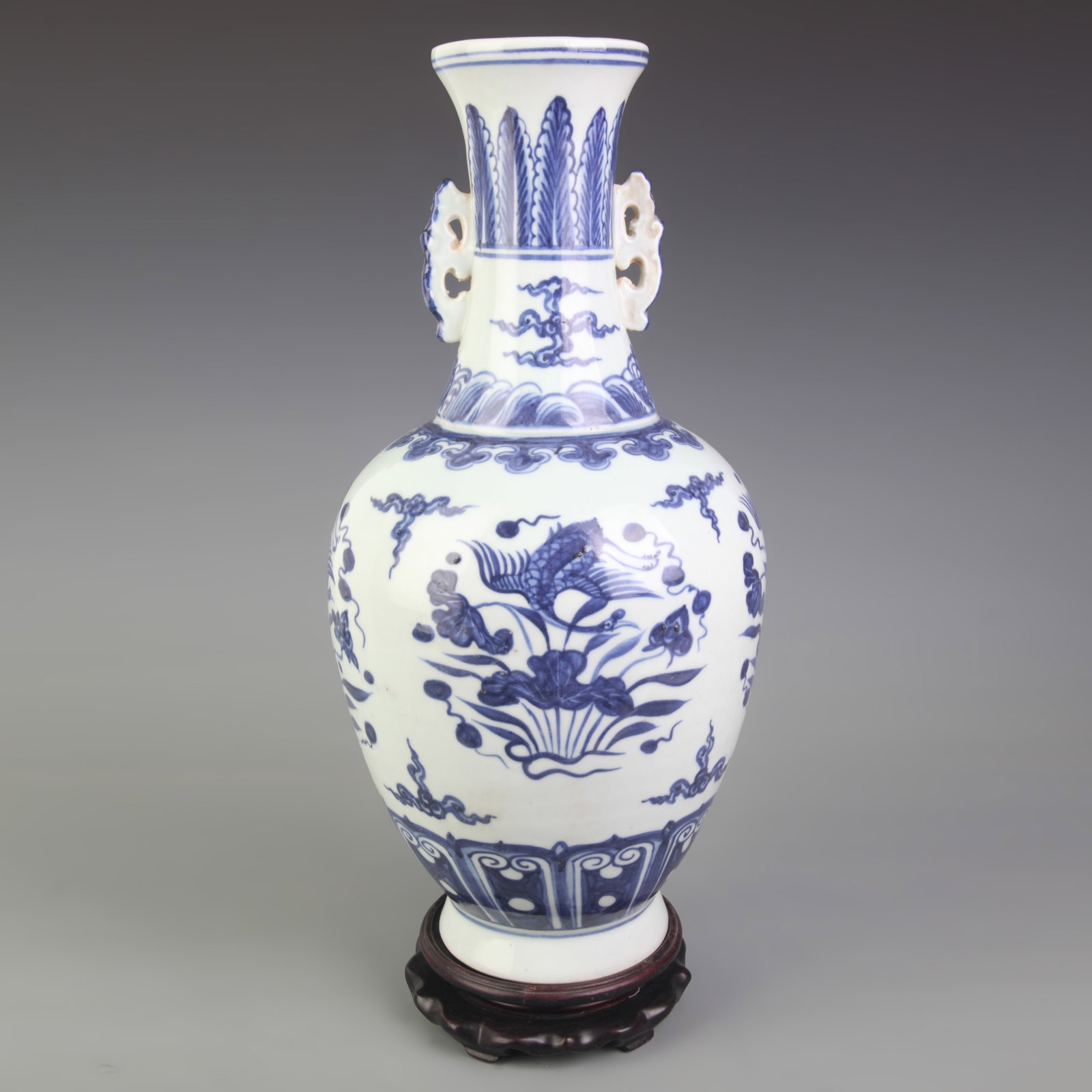 BLUE AND WHITE PORCELAIN VASE WITH BIRD AND FLOWER MOTIFS AND TWIN HANDLES: Ming Dynasty Style; High: 15.2 inch; Diameter: 3.2 inch; Woodbase for picture and display only