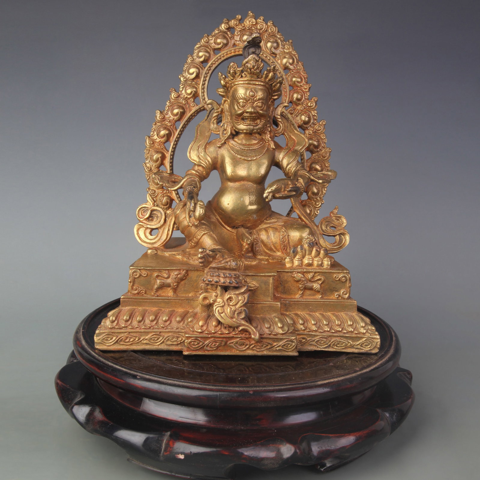 A FINE BRONZE DZAMBHALA BUDDHA STATUE: Qing Dynasty; Width: 7.4 inch; High: 9.5 inch; Woodbase for picture and display only
