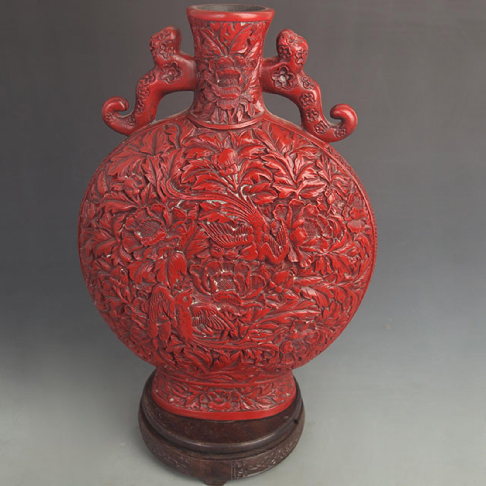CARVED RED LACQUER PHOENIX AND PEONY PATTERN VASE: Qing Dynasty, High: 14.5 inch; Width: 11.5 inch; Woodbase for picture and display only