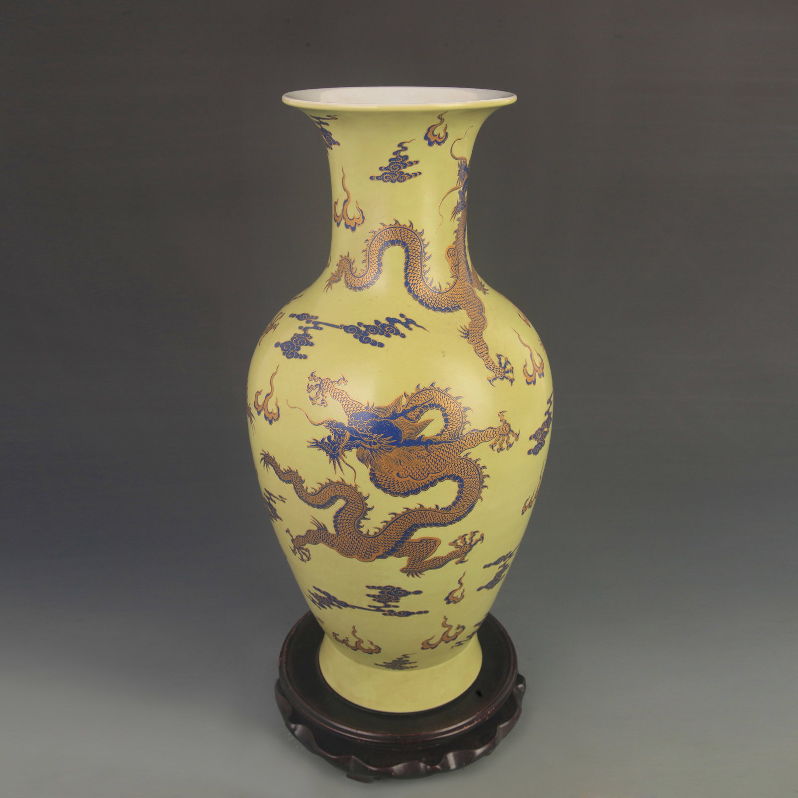 FAMILLE ROSE YELLOW-GROUND DRAGON PATTERN PORCELAIN VASE: Qing Dynasty Kang Xi Period; High: 16.0 inch; Diameter: 7.20 inch; Woodbase for picture and display only