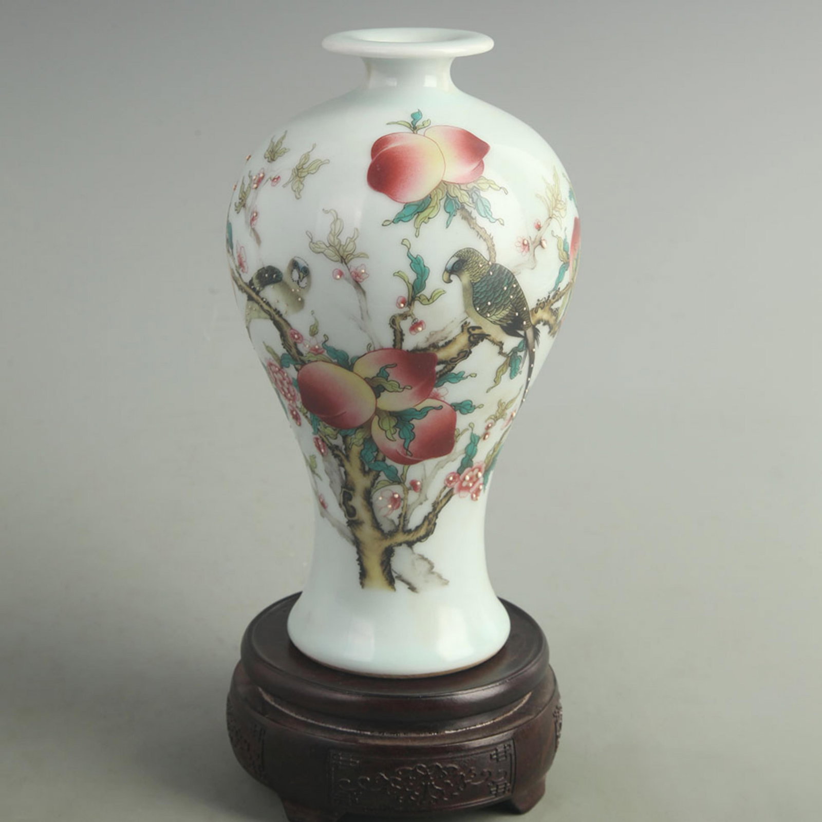FAMILLE ROSE MEIPING VASE WITH PEACH MOTIF: Qing Dynasty Qian Long Period; High: 8.50 inch; Width: 4.50 inch; Woodbase for picture and display only