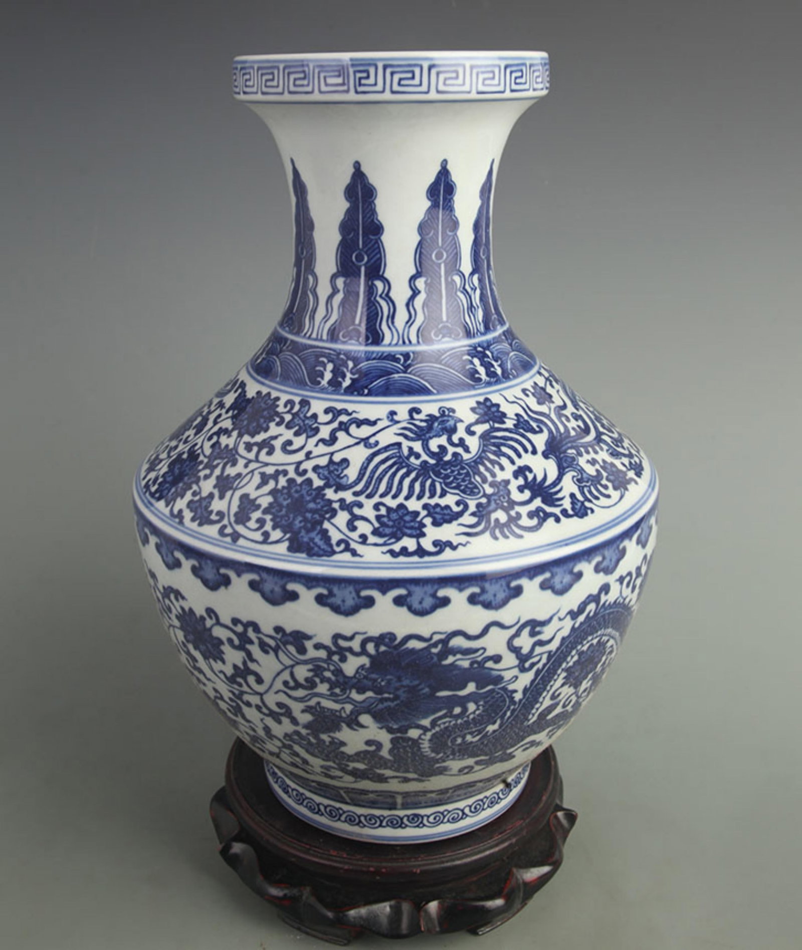 BLUE AND WHITE STRAIGHT-NECK VASE WITH DRAGON MOTIF: Qing Dynasty Qian Long Period; High: 13.0 inch; Width: 8.50 inch; Woodbase for picture and display only