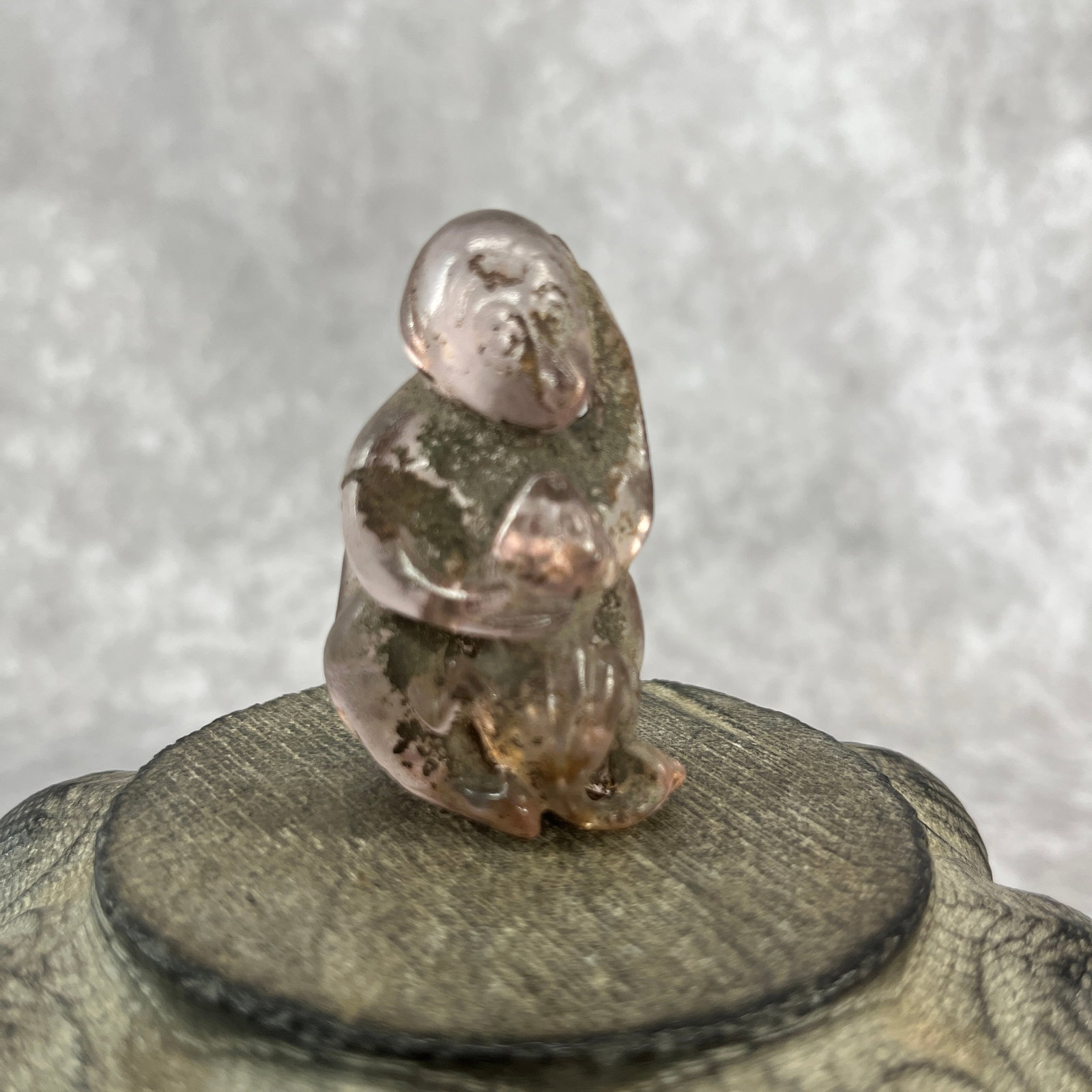 HAND-CARVED CRYSTAL FIGURINE OF A MONKEY: Modern; Long: 2.02 inch; Width: 1.2 inch; High: 0.81 inch; Woodbase for picture and display only