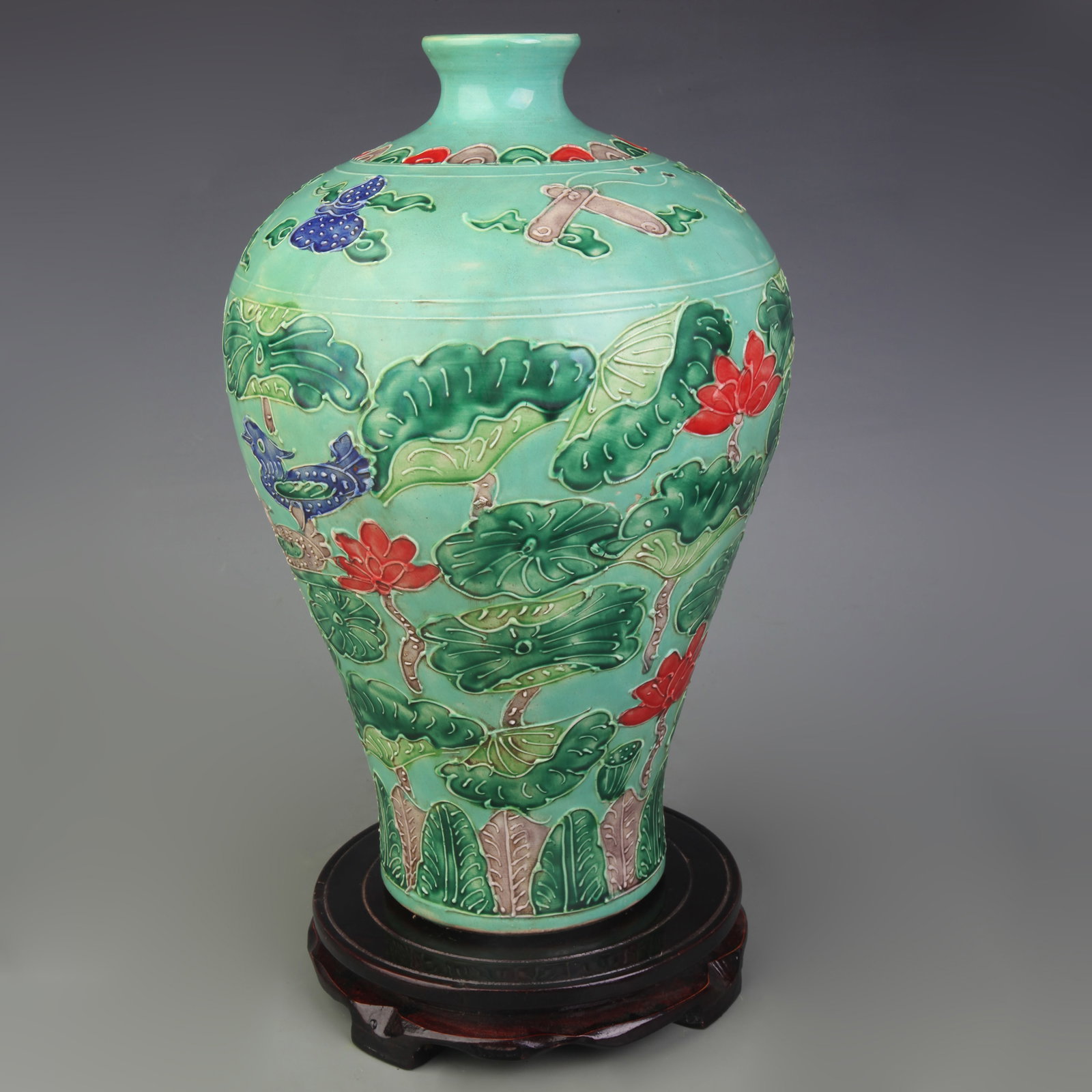 FAHUA GLAZE CARVED BIRD AND FLOWER PATTERN MEIPING VASE: Ming Dynasty Style Hong Zhi Period; High: 12.9 inch; Woodbase for picture and display only