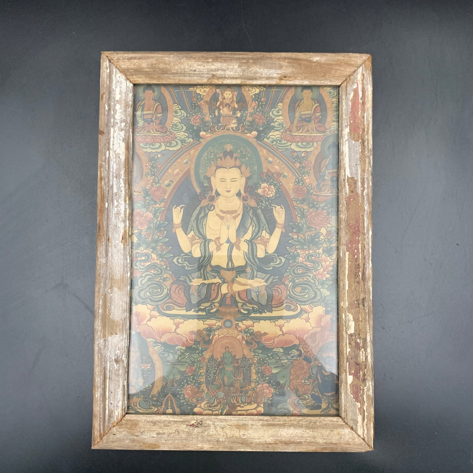 A FINE FRAMED TIBETAN PAINTING – FOUR-ARMED AVALOKITESHVARA: Qing Dynasty; Long: 11.5 inch; Width: 8 inch; High: 0.7 inch; Woodbase for picture and display only