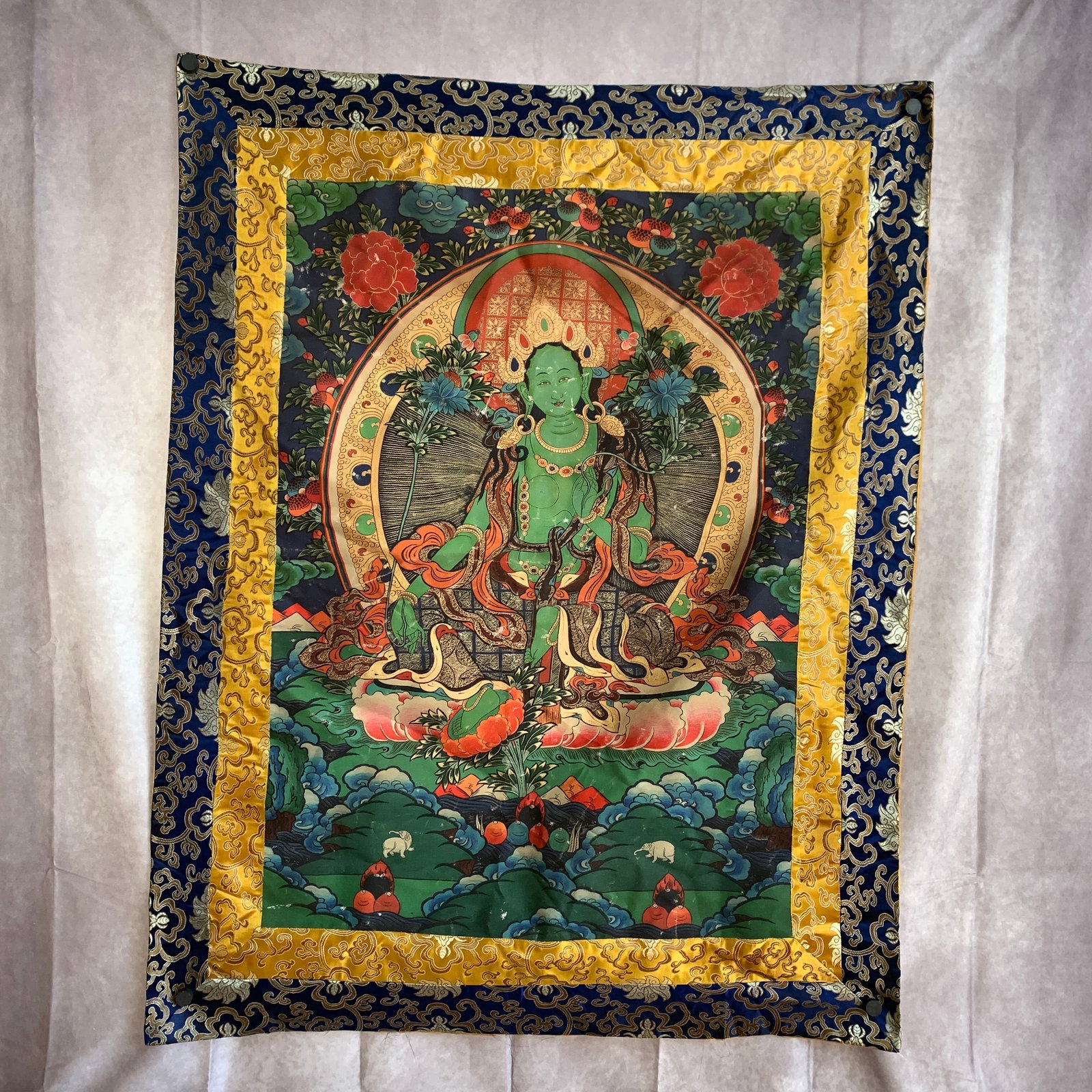 A FINE TIBETAN BUDDHIST THANGKA IN FIGURE OF GREEN TARA: Qing Dynasty; Long: 45 inch; Width: 34 inch; Woodbase for picture and display only