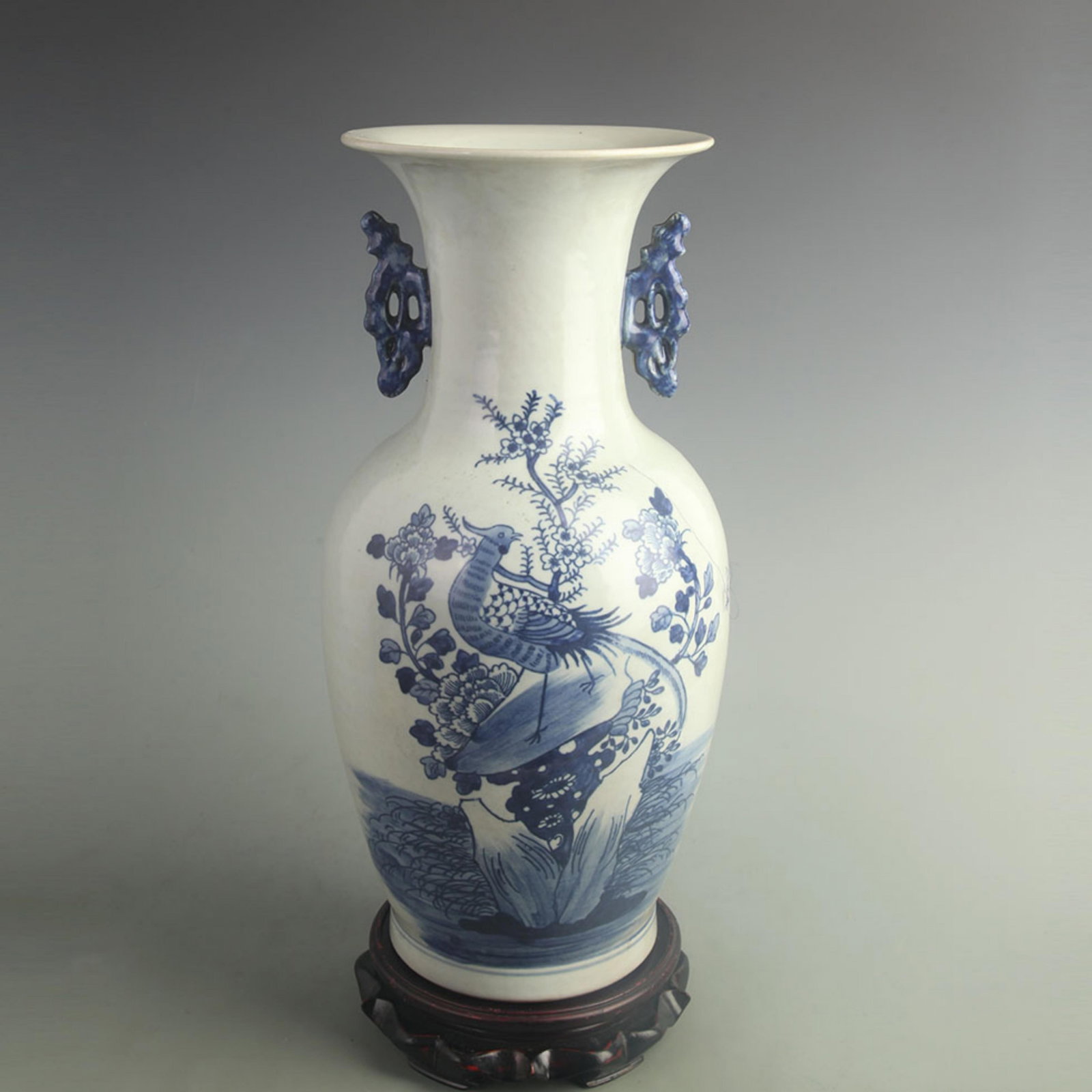 BLUE AND WHITE FLORAL AND BIRD PATTERN DOUBLE EARED PORCELAIN VASE: Qing Dynasty; High: 16.2 inch; Width: 8.00 inch; Woodbase for picture and display only