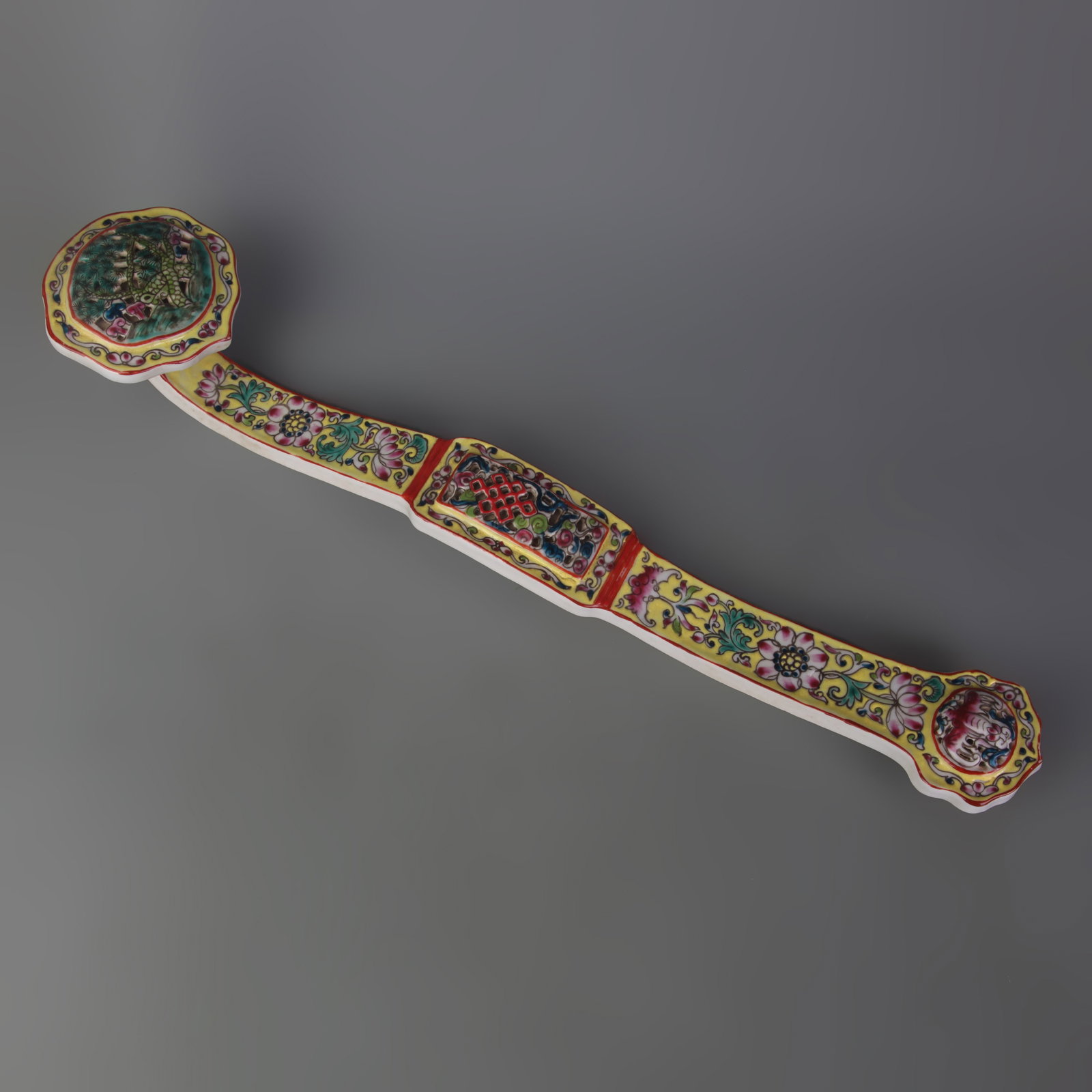 FAMILLE ROSE RUYI SCEPTER WITH FLORAL DECORATION: Qing Dynasty Qian Long Period; Long:19.2inch; Woodbase for picture and display only