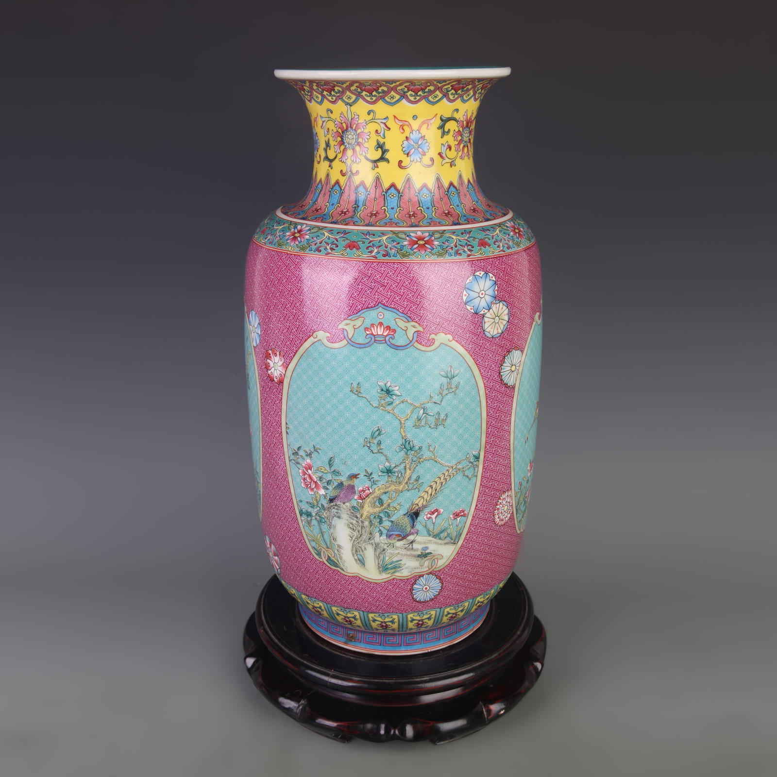 FAMILLE ROSE VASE WITH FRAMED FLORAL AND BIRD DESIGN: Qing Dynasty Qian Long Period; Diameter: 8.5 inch; High: 16.5 inch; Woodbase for picture and display only