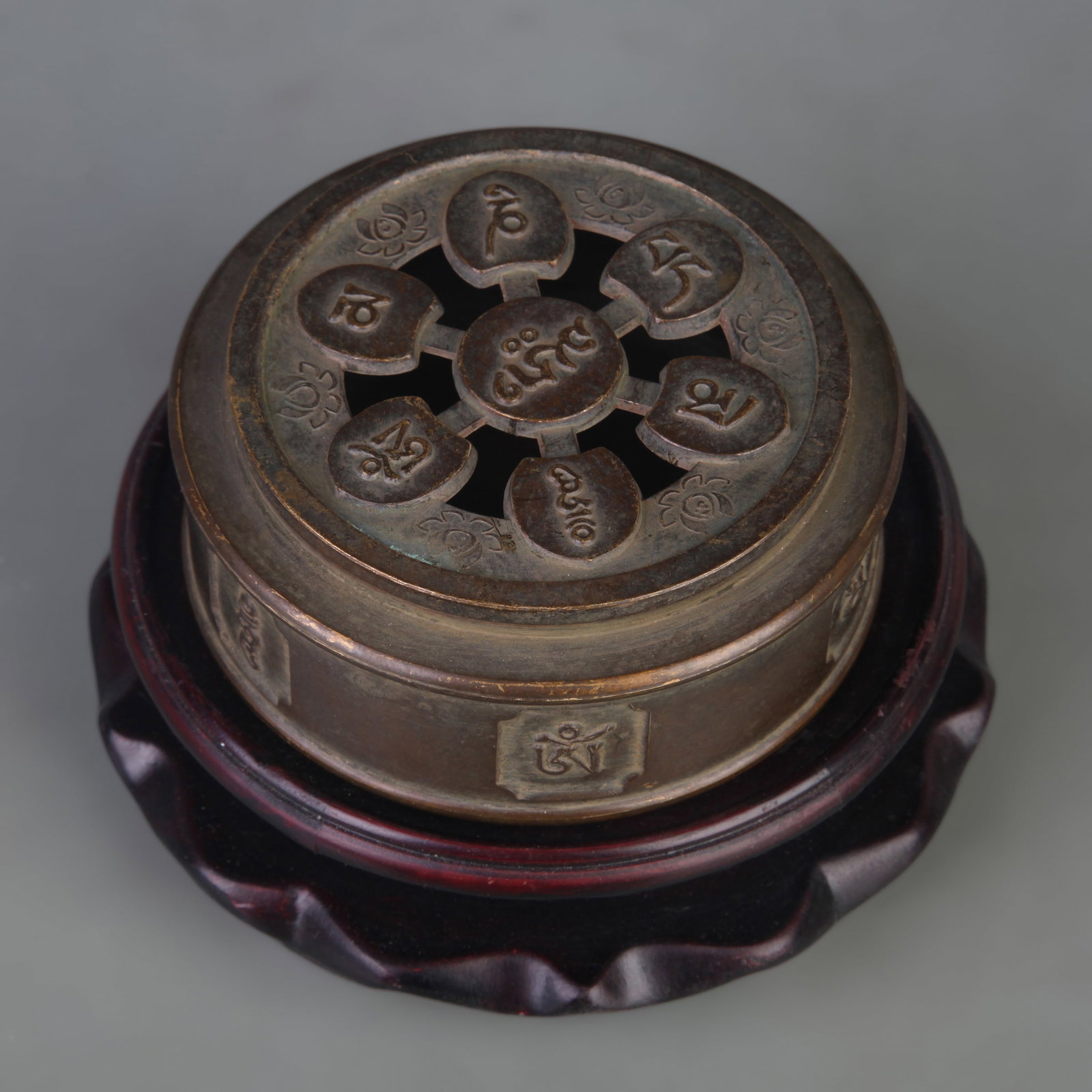 TRIPOD INCENSE BURNER WITH SIX TRUE WORDS MANTRA AND ROUND FOOT: Ming Dynasty Style; Diameter: 3.9 inch; High: 1.6 inch; Woodbase for picture and display only