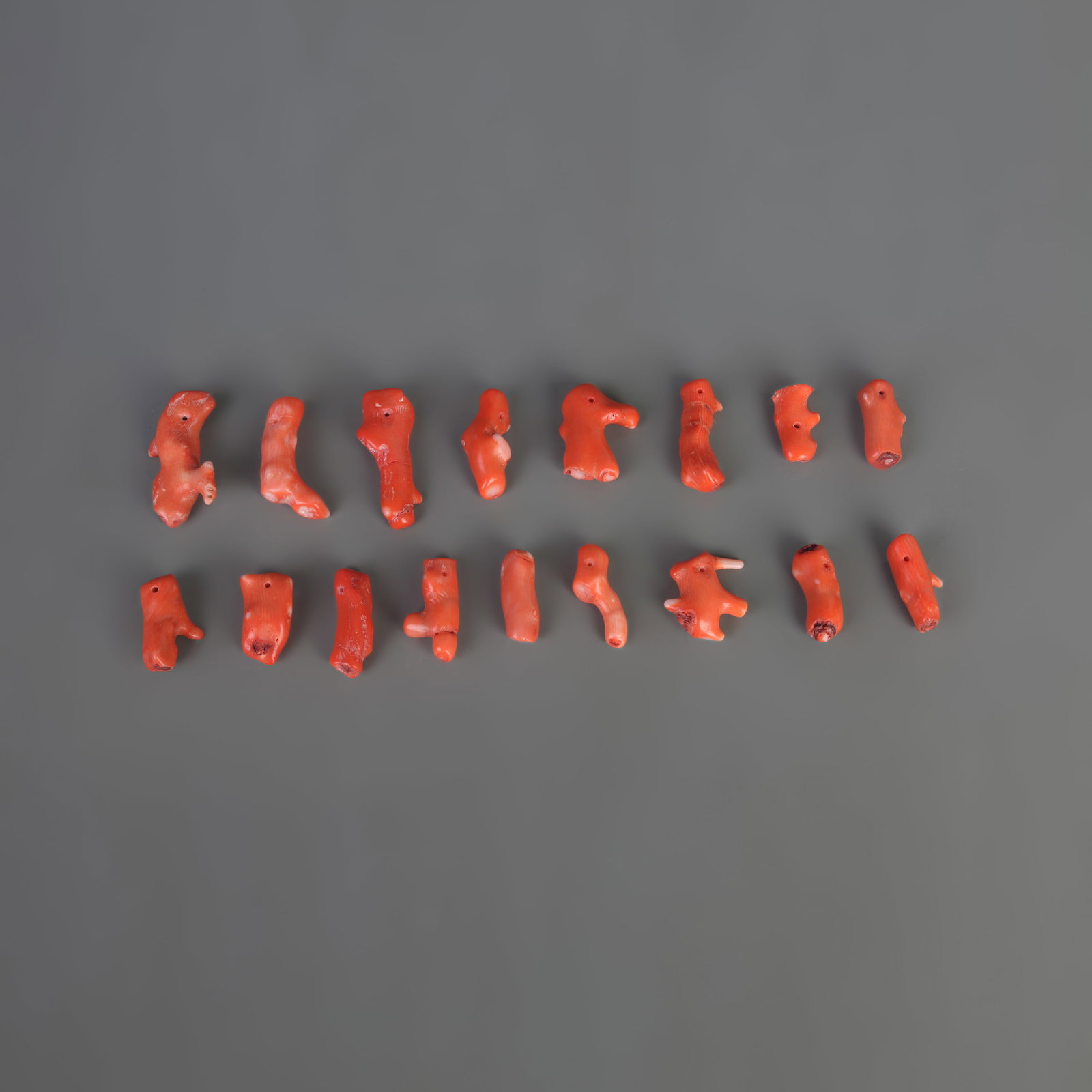 A GROUP OF CORAL PENDANTS: Modern; Long: 1.0 inch; to 2.5 inch; Woodbase for picture and display only