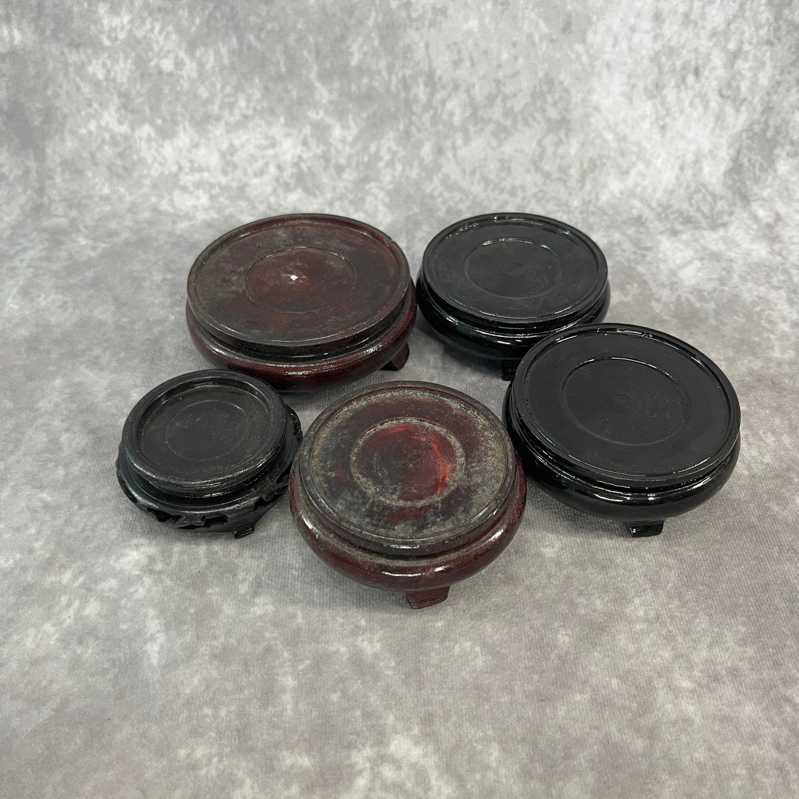 GROUP OF HARDWOOD MADE DISPLAY STAND: Modern; High: 1.24 inch; Diameter: 3.3 inch; High: 1.4 inch; Diameter: 3.85 inch; High: 1.3 inch; Diameter: 3.2 inch; High: 1.1 inch; Diameter: 2.68 inch; High: 1.24 inch; Diameter: 3.3 inch;