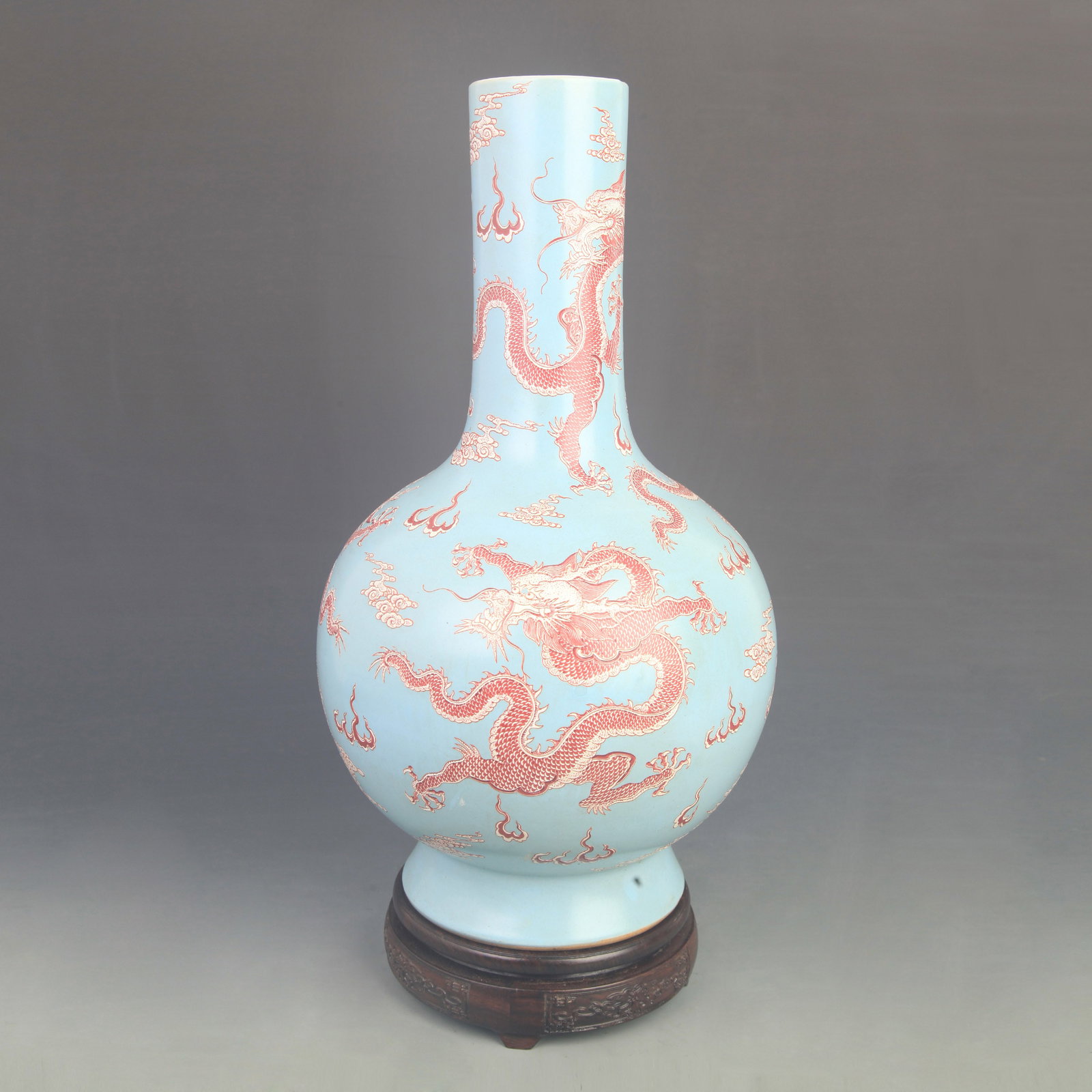 FAMILLE ROSE PALE-BLUE GROUND PORCELAIN VASE WITH DRAGON MOTIF: Qing Dynasty Kang Xi Period; High: 16.8 inch; Diameter: 8.00 inch; Woodbase for picture and display only