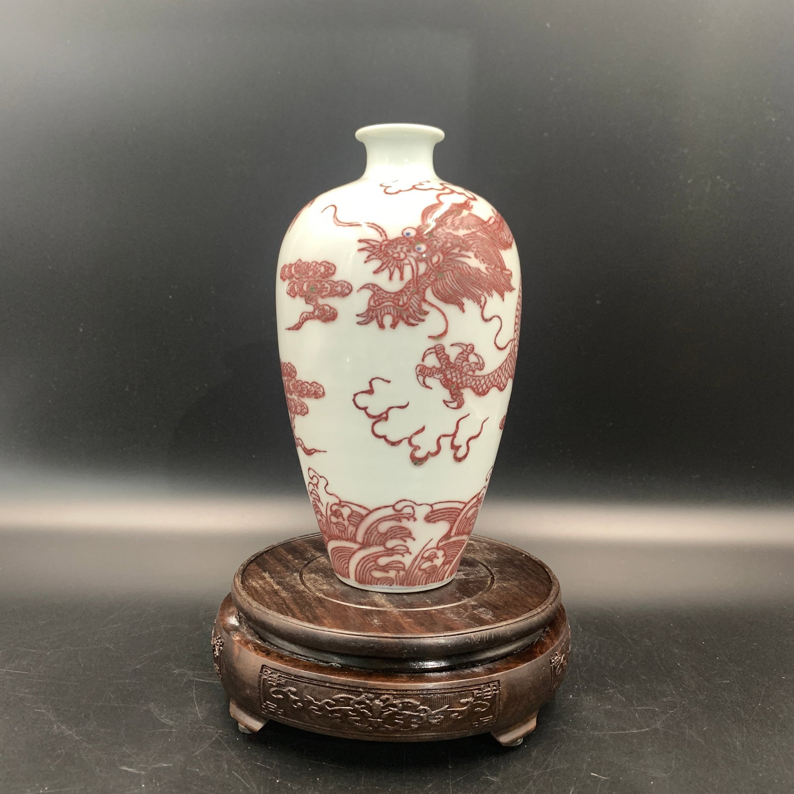UNDERGLAZE RED "DRAGON AND SEA WAVES" PORCELAIN VASE: Ming Dynasty Style; High: 8 inch; Diameter: 4.4 inch; Woodbase for picture and display only