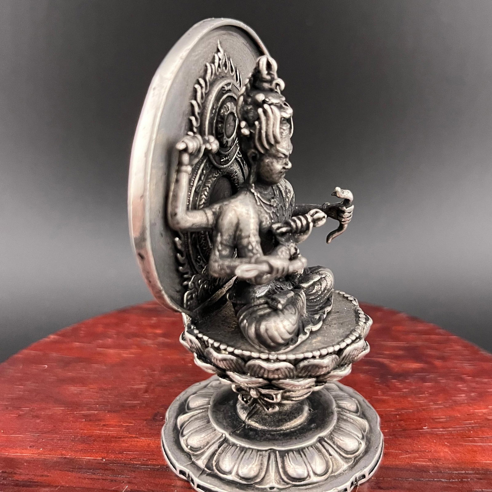 A SMALL WHITE BRONZE BUDDHA STATUE - 2