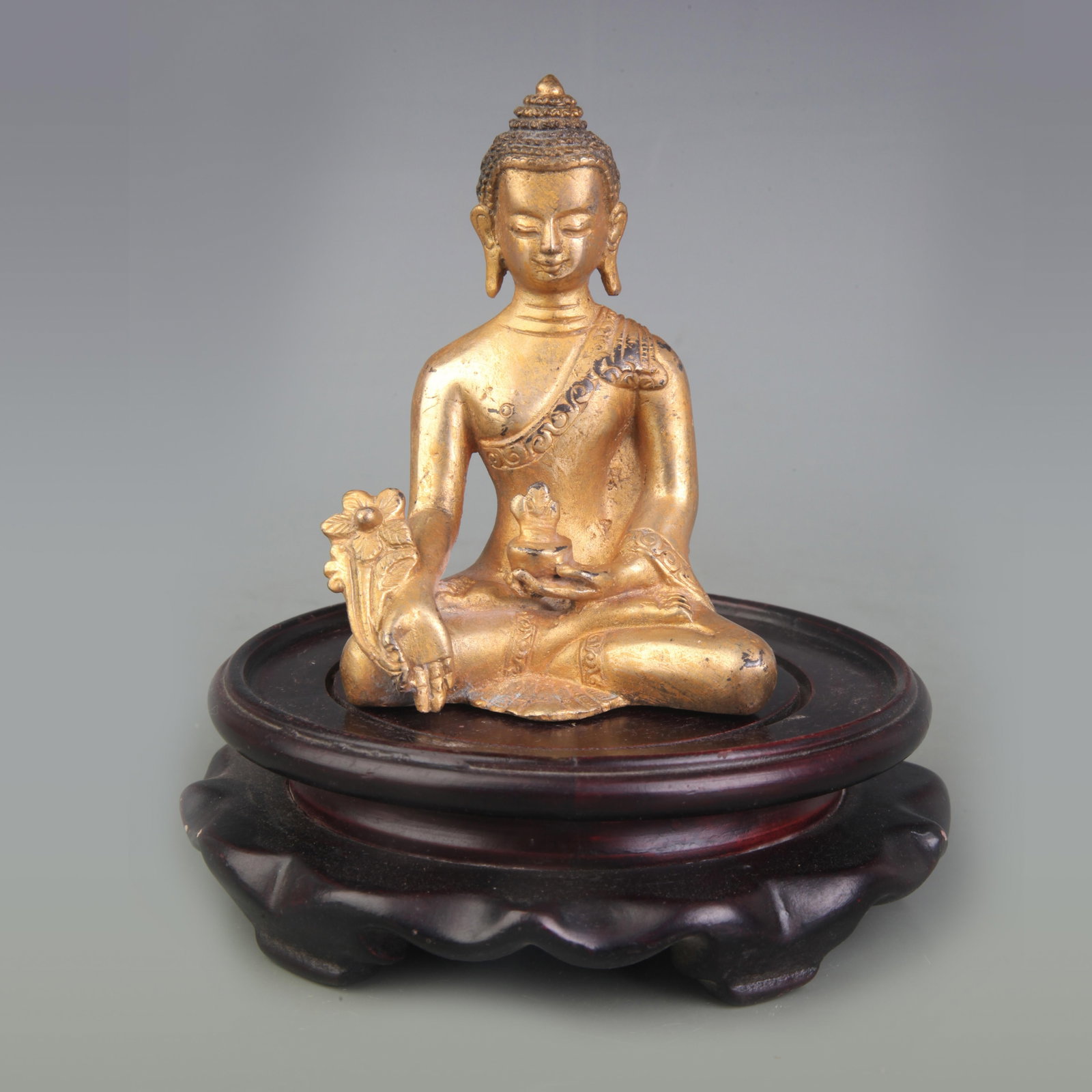 A FINE SMALL BRONZE MEDICINE BUDDHA: Qing Dynasty; High: 4.0 inch; Woodbase for picture and display only