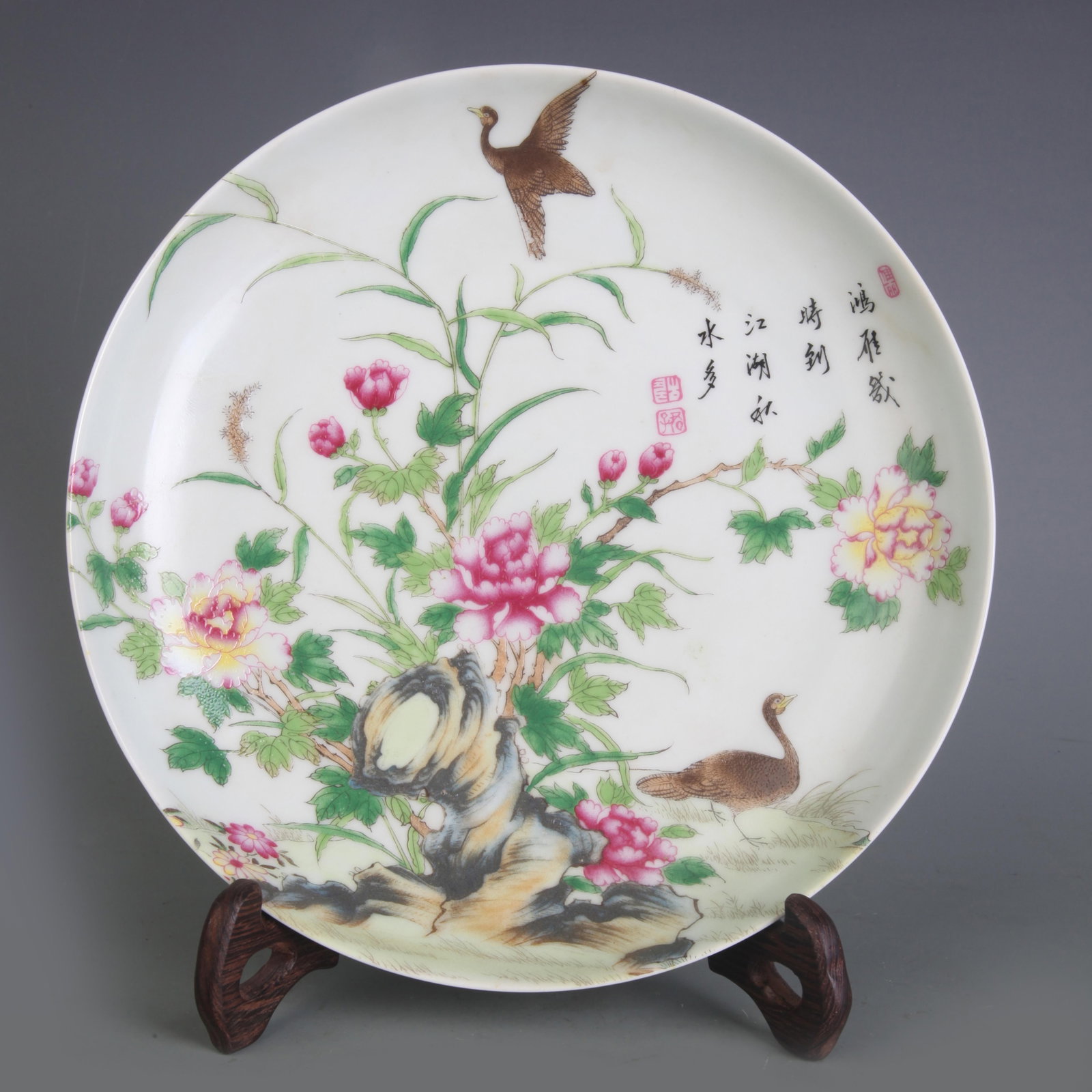 FAMILLE ROSE FLOWER AND BIRD PORCELAIN PLATE: Qing Dynasty Qian Long Period; Diameter: 8.2 inch; Woodbase for picture and display only