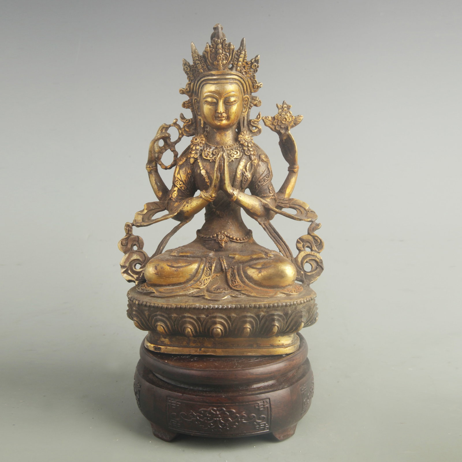 GILT BRONZE STATUE OF FOUR-ARMED GUANYIN: 20th Century; High: 8.00 inch; Width: 5.00 inch; Woodbase for picture and display only