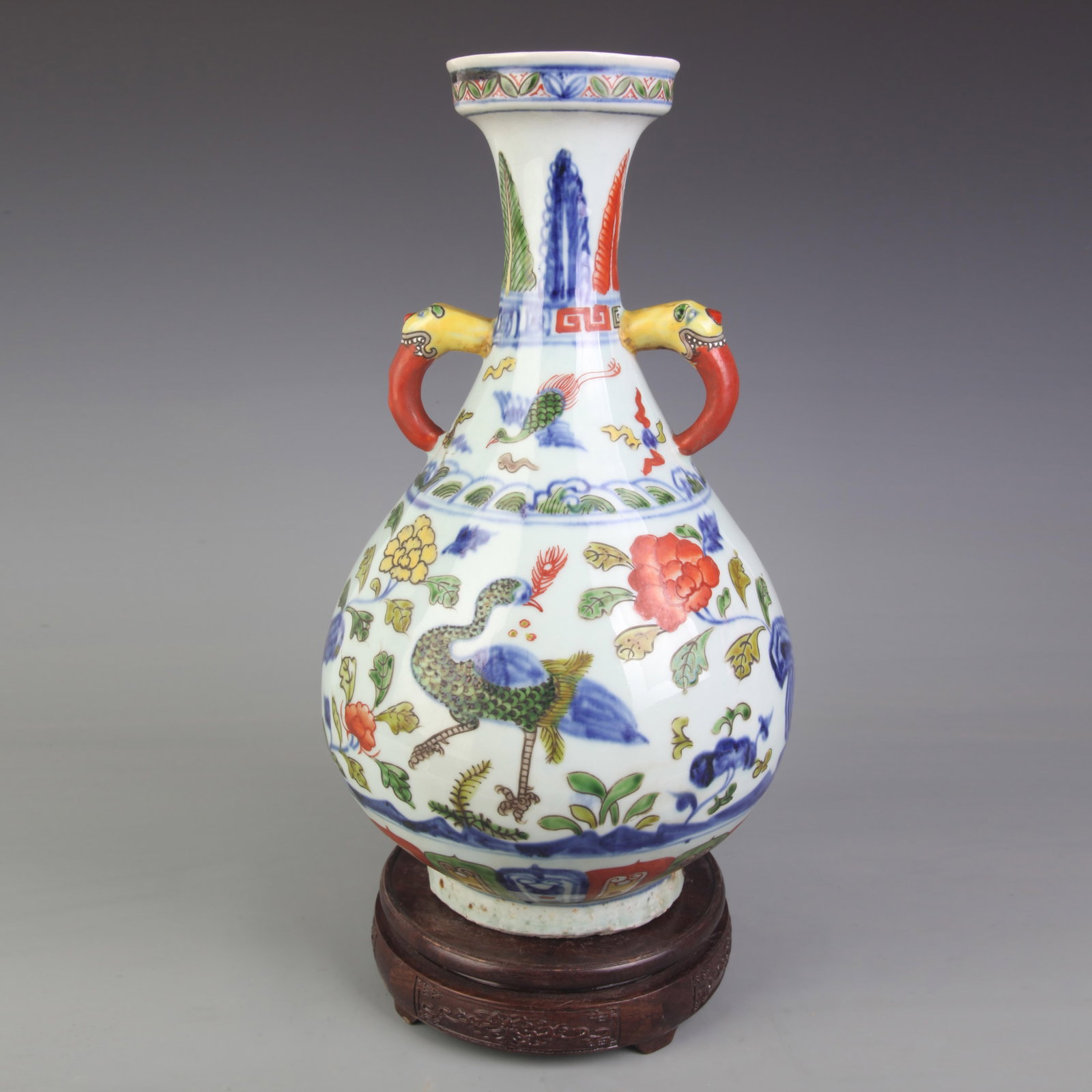 BLUE AND WHITE, DOUCAI COLOR PEACOCK PATTERN PORCELAIN VASE: Qing Dynasty; High: 14.2 inch; Diameter: 7.3 inch; Woodbase for picture and display only