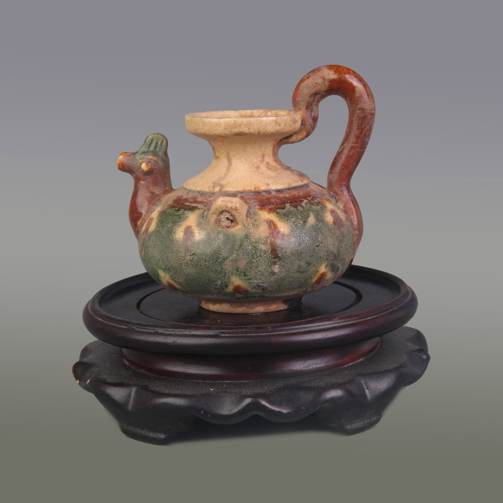 A FINE SAN CAI COLOR SMALL CLAY MADE EWER: Tang Dynasty Style; High: 3.2inch; Woodbase for picture and display only