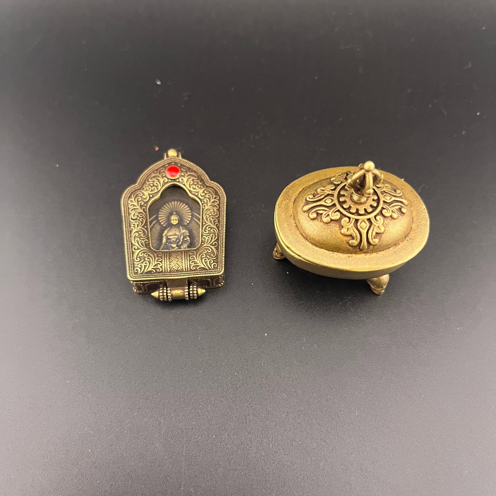TIBETAN MINIATURE BRASS GAU (TRAVEL SHRINE) & TRIPOD BOX SET: Modern; Long: 1.7 inch; Width: 1.38 inch; High: 1.9 inch; Long: 2.1 inch; Width: 1.28 inch; High: 0.42 inch; . Wooden base for display only
