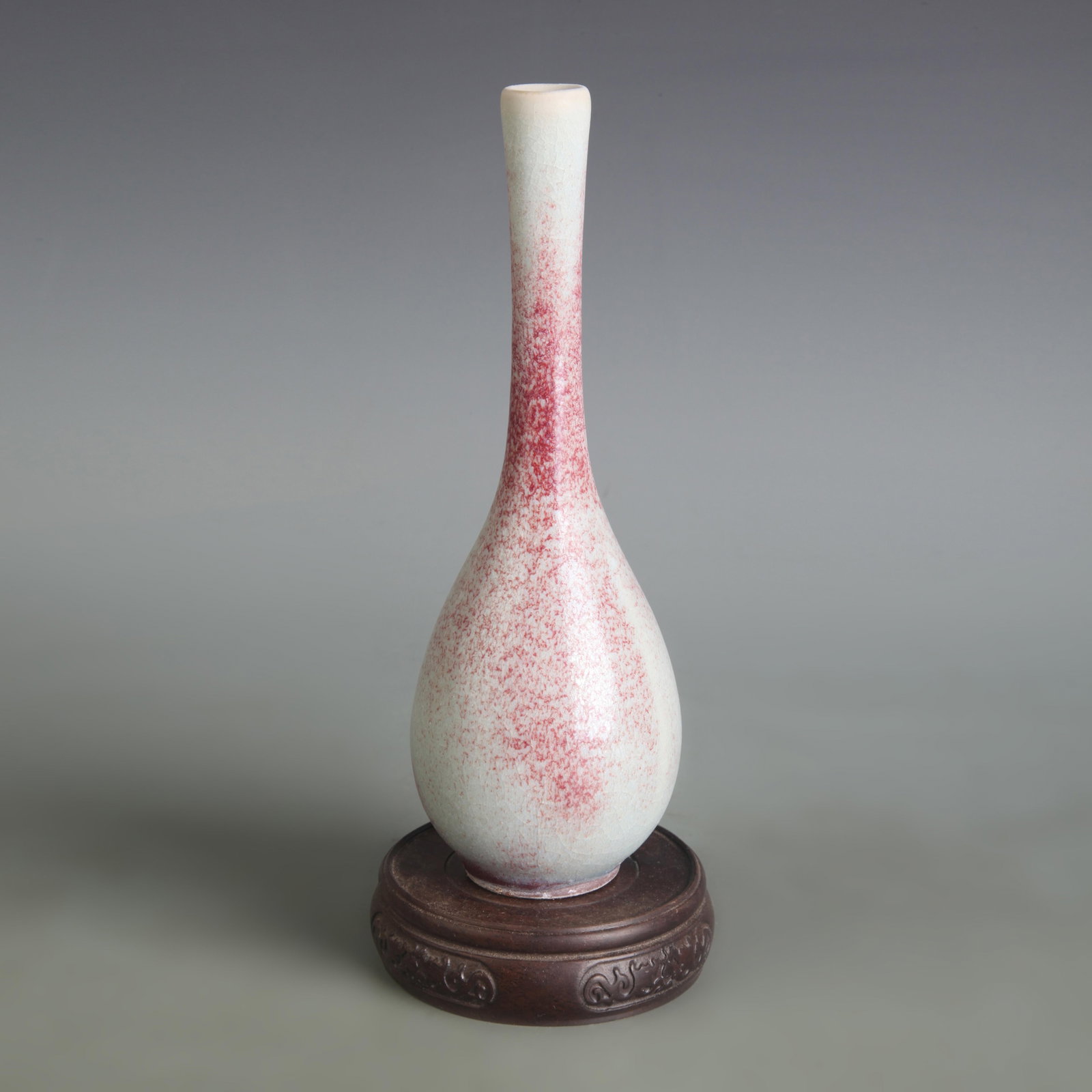 A FINE JUN KILN SMALL PORCELAIN BOTTLE: Song Dynasty Style; Diameter: 1.8 inch; High: 8.6 inch; . Wooden base for display only