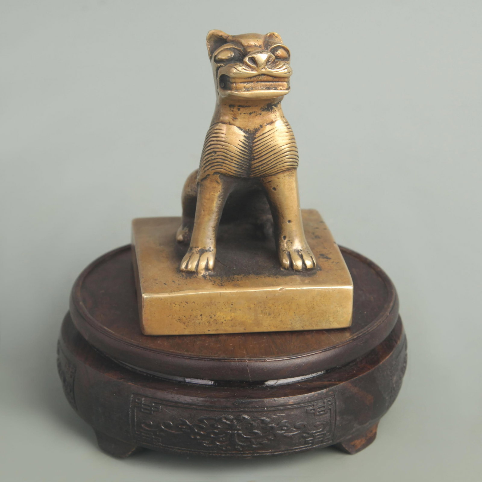 BRONZE CARVED AUSPICIOUS BEAST BRONZE SEAL: 19th Century; High: 4.25 inch; Width: 3.25 inch; . Wooden base for display only