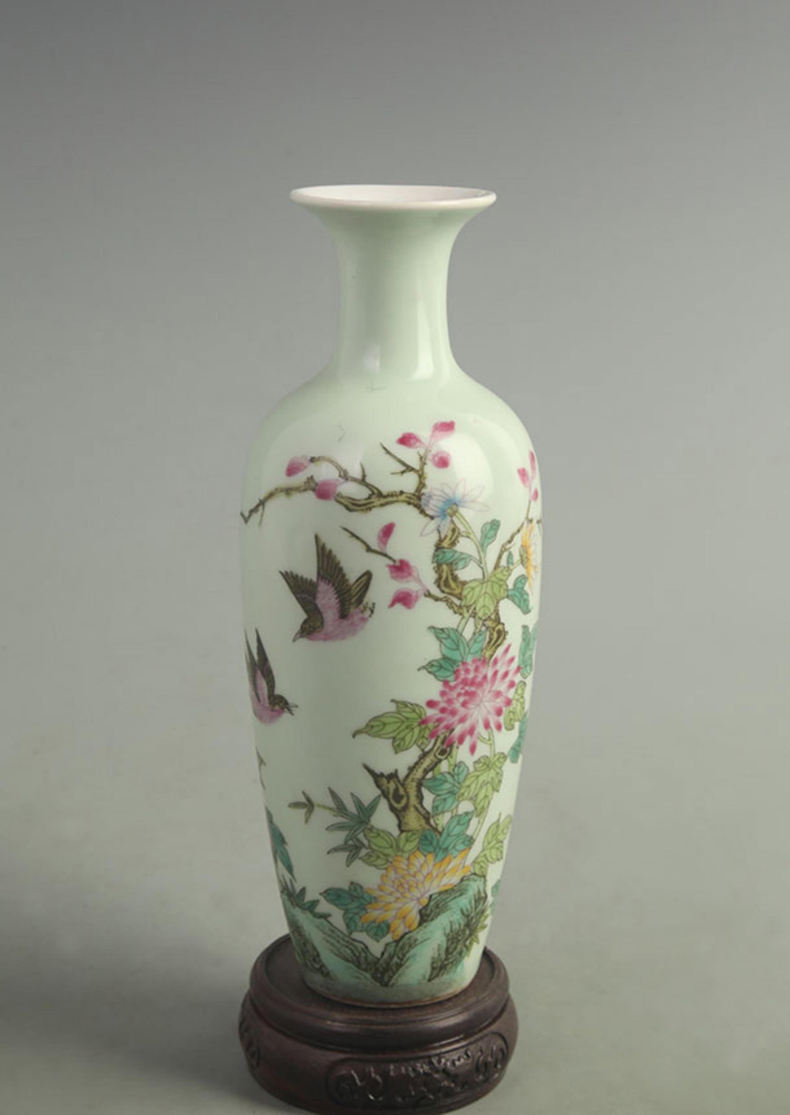 FAMILLE ROSE CELADON GLAZE CHRYSANTHEMUM AND BIRD GUANYIN STYLE VASE: Qing Dynasty Yong Zheng Period; High: 8.50 inch; Width: 3.00 inch. Wooden base for display only