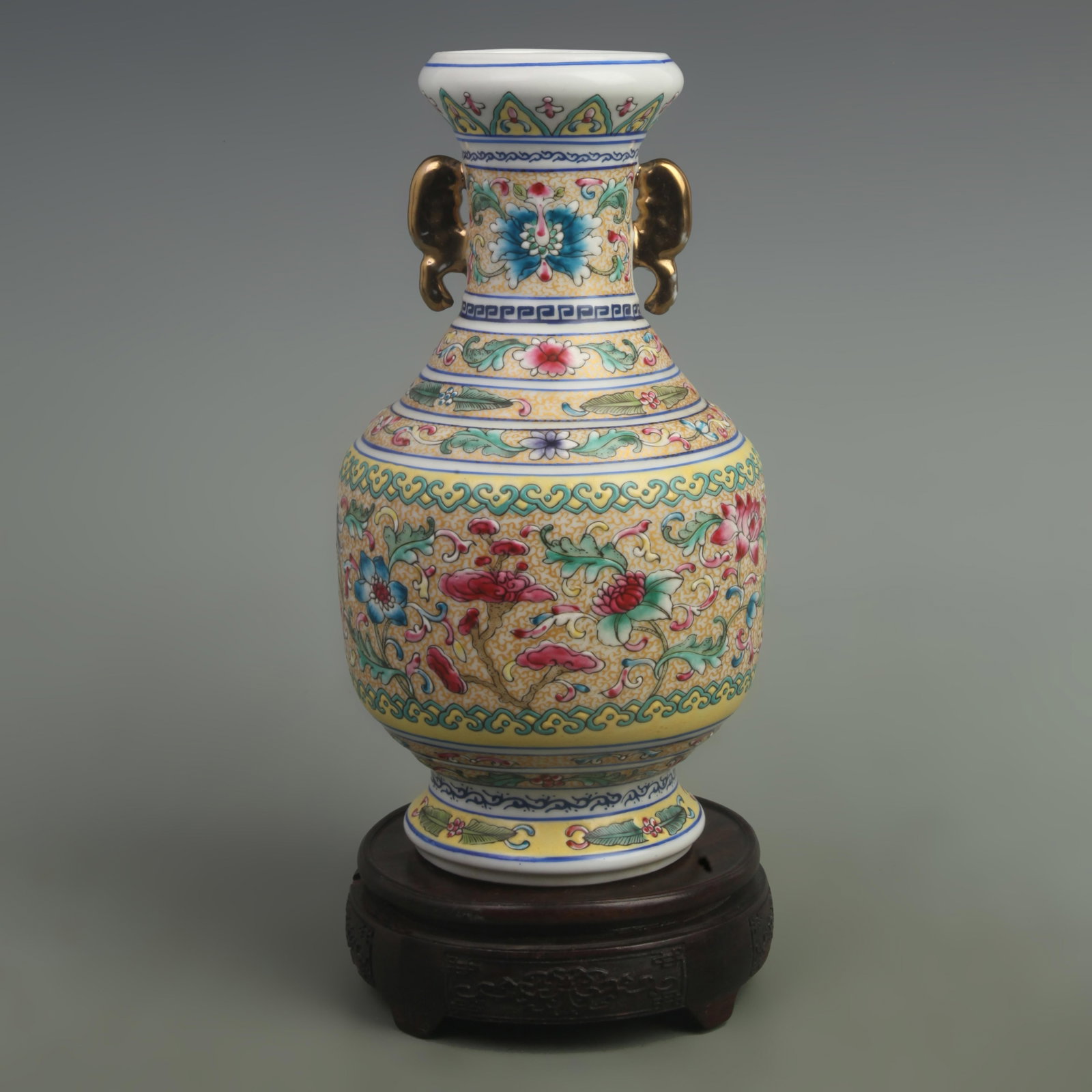 FAMILLE ROSE FLOWER PATTERN PAINTED PORCELAIN VASE: Qing Dynasty Qian Long Period; High: 10.3 inch High: 6 inch . Wooden base for display only