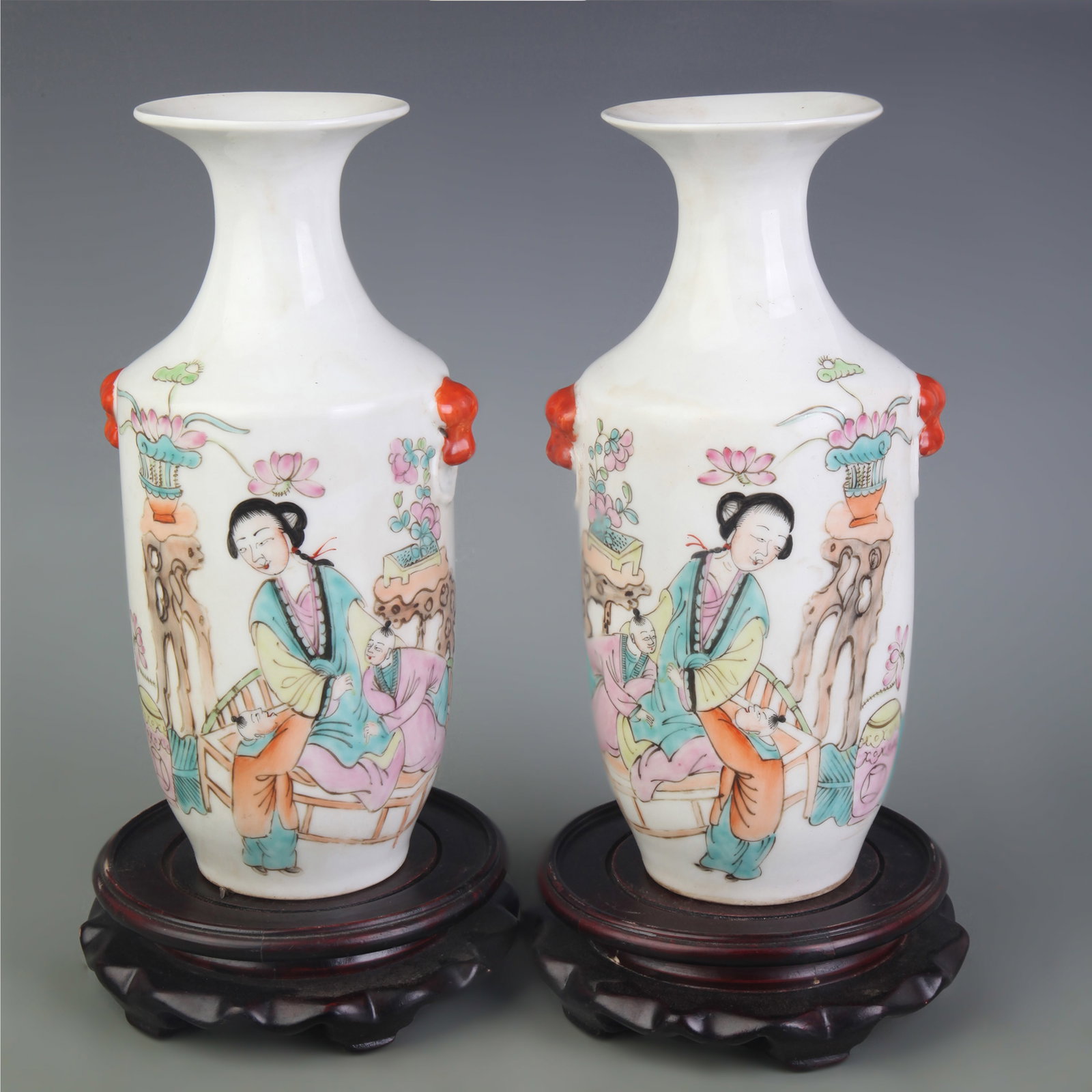 A PAIR OF FAMILLE ROSE DOUBLE-HANDLED VASES WITH FLORAL DECORATION: Qing Dynasty; Diameter: 2.9 inch; High: 8.6 inch; . Wooden base for display only