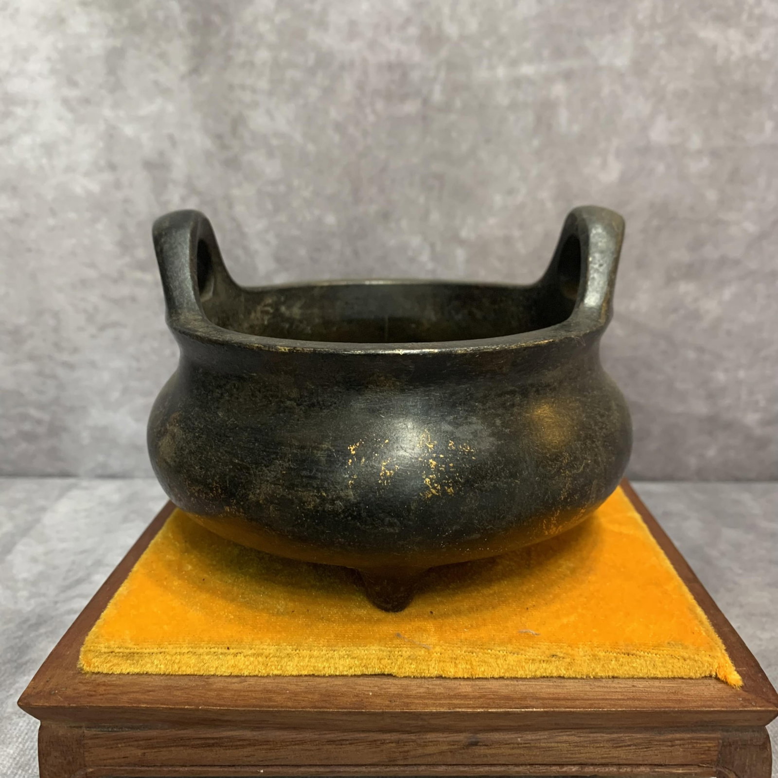A FINE THREE FOOT BRONZE CENSER: 20th Century; High: 3.7 inch; Diameter: 5.3 inch. Wooden base for display only