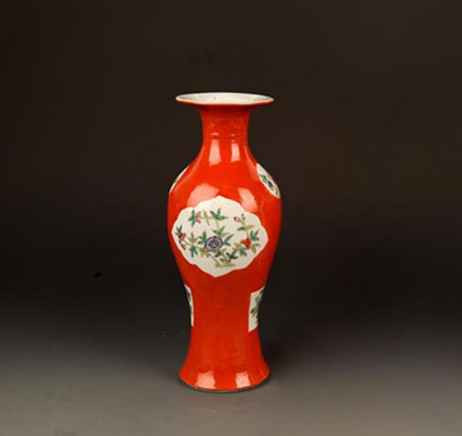 A FINE RED GROUND FAMILLE ROSE PATTERN PORCELAIN GUANYIN VASE: Republic Period; Diameter: High: 10.5 inch; Width: 3.5 inch; . Wooden base for display only