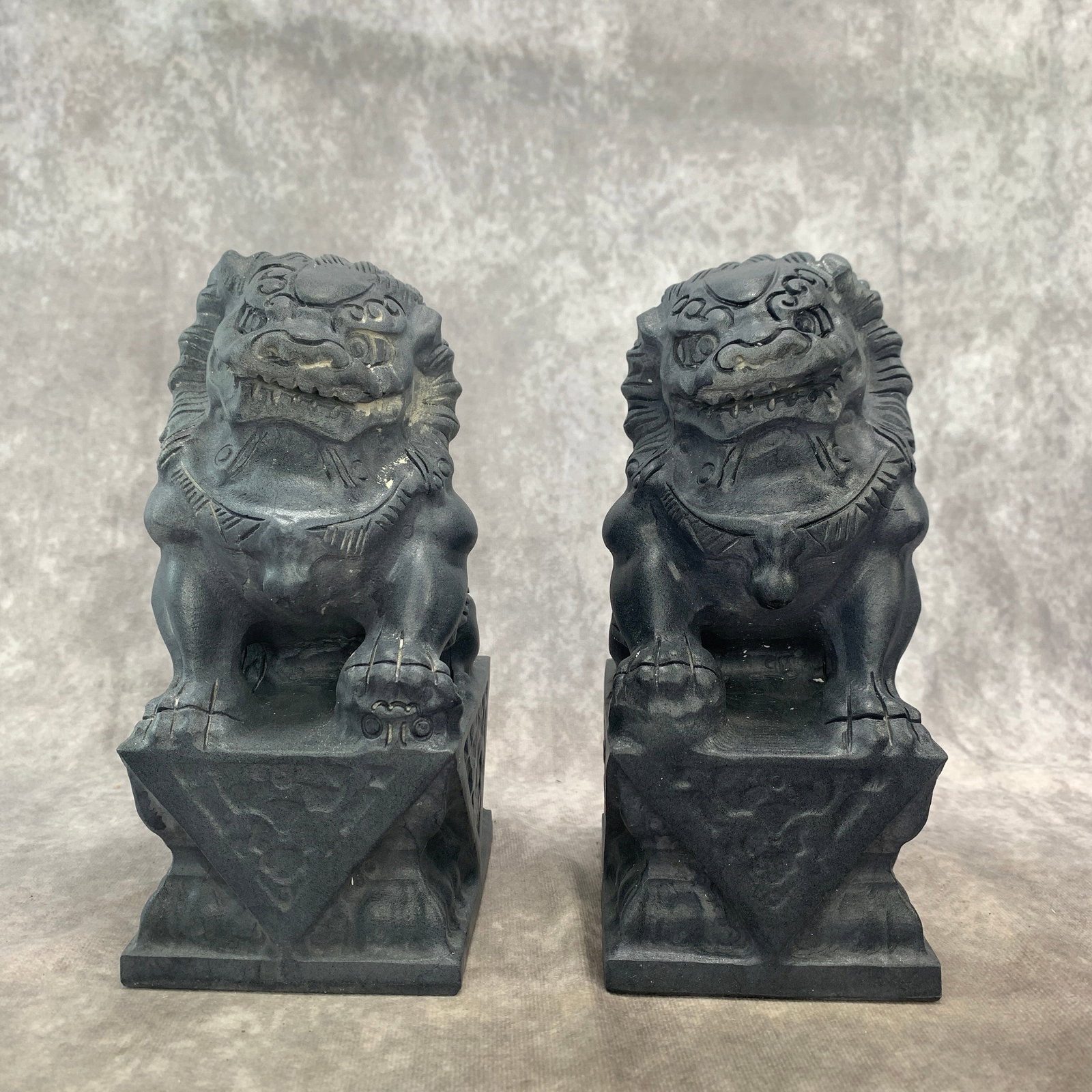 PAIR OF CHINESE CARVED STONE FOO DOGS: Modern; Long: 4.3 inch; Width: 3.5 inch; High: 7.9 inch; . Wooden base for display only