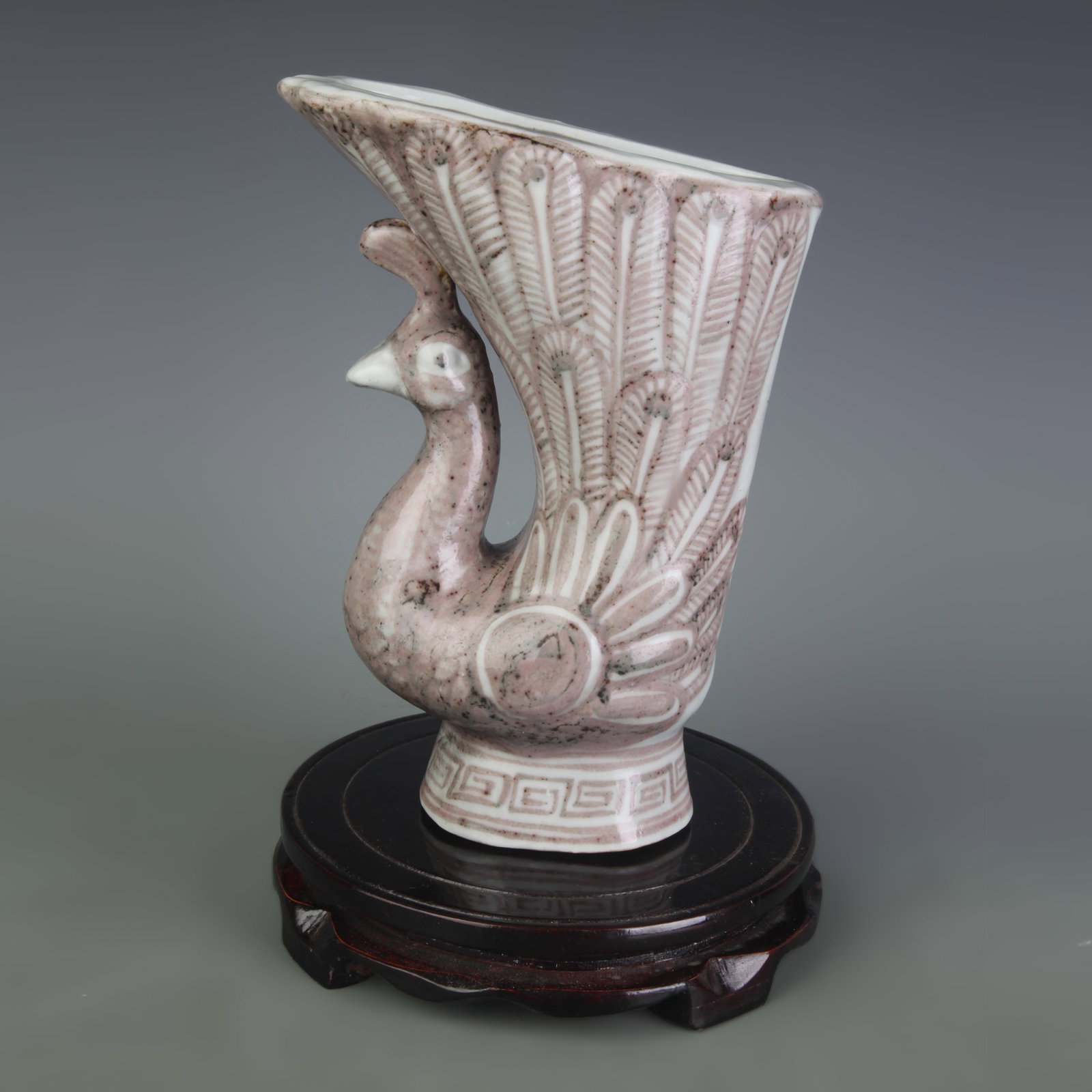 UNDERGLAZE RED PEACOCK-SHAPED PORCELAIN VASE: Ming Dynasty Style; High: 8.8 inch; Width: 6.5 inch; . Wooden base for display only