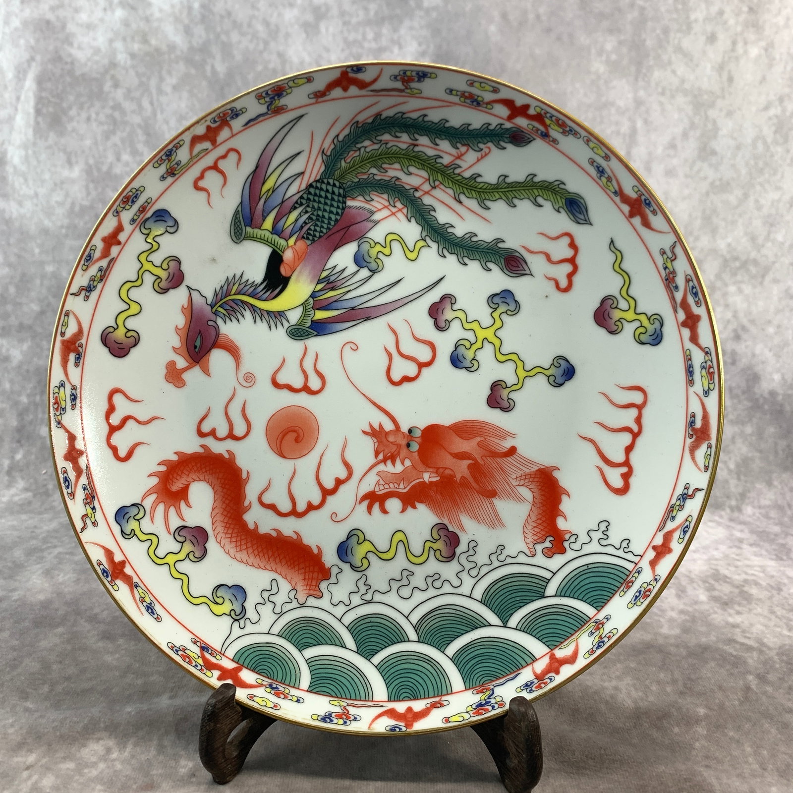 WUCAI "DRAGON AND PHOENIX" HARMONY PLATE: Republic Period; High: 1.1 inch; Diameter: 10.2 inch; . Wooden base for display only