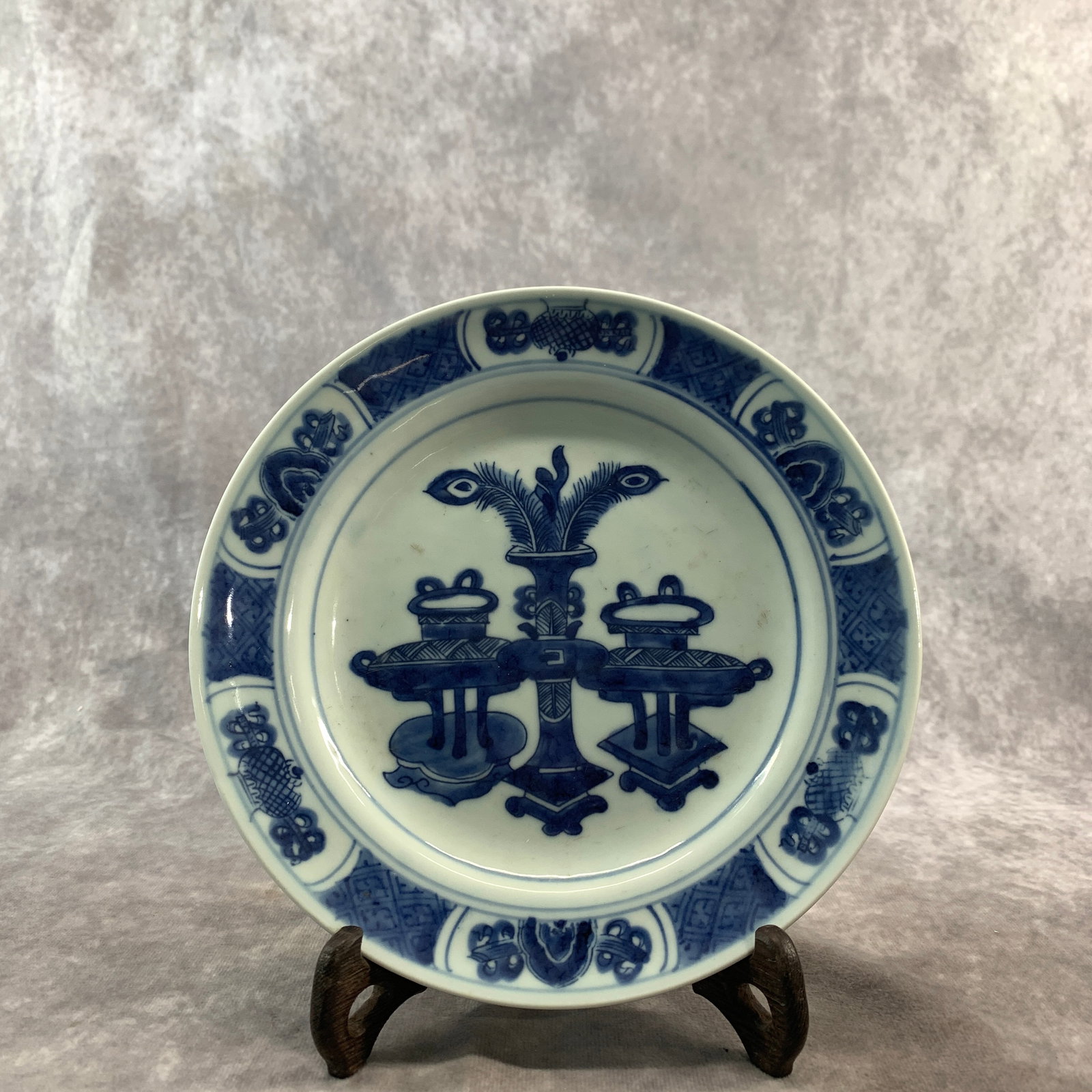 BLUE AND WHITE "FLOWER BASKET" PORCELAIN PLATE: Ming Dynasty Style; High: 1.1 inch; Diameter: 8.2 inch; . Wooden base for display only