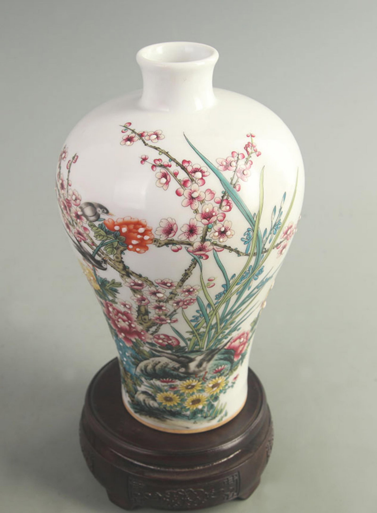 A FINE ENAMEL COLOR FLOWER AND BIRD PATTERN MEI STYLE BOTTLE: Qing Dynasty Qianlong Period: High: 8.50 inch; Width: 5.00 inch; . Wooden base for display only