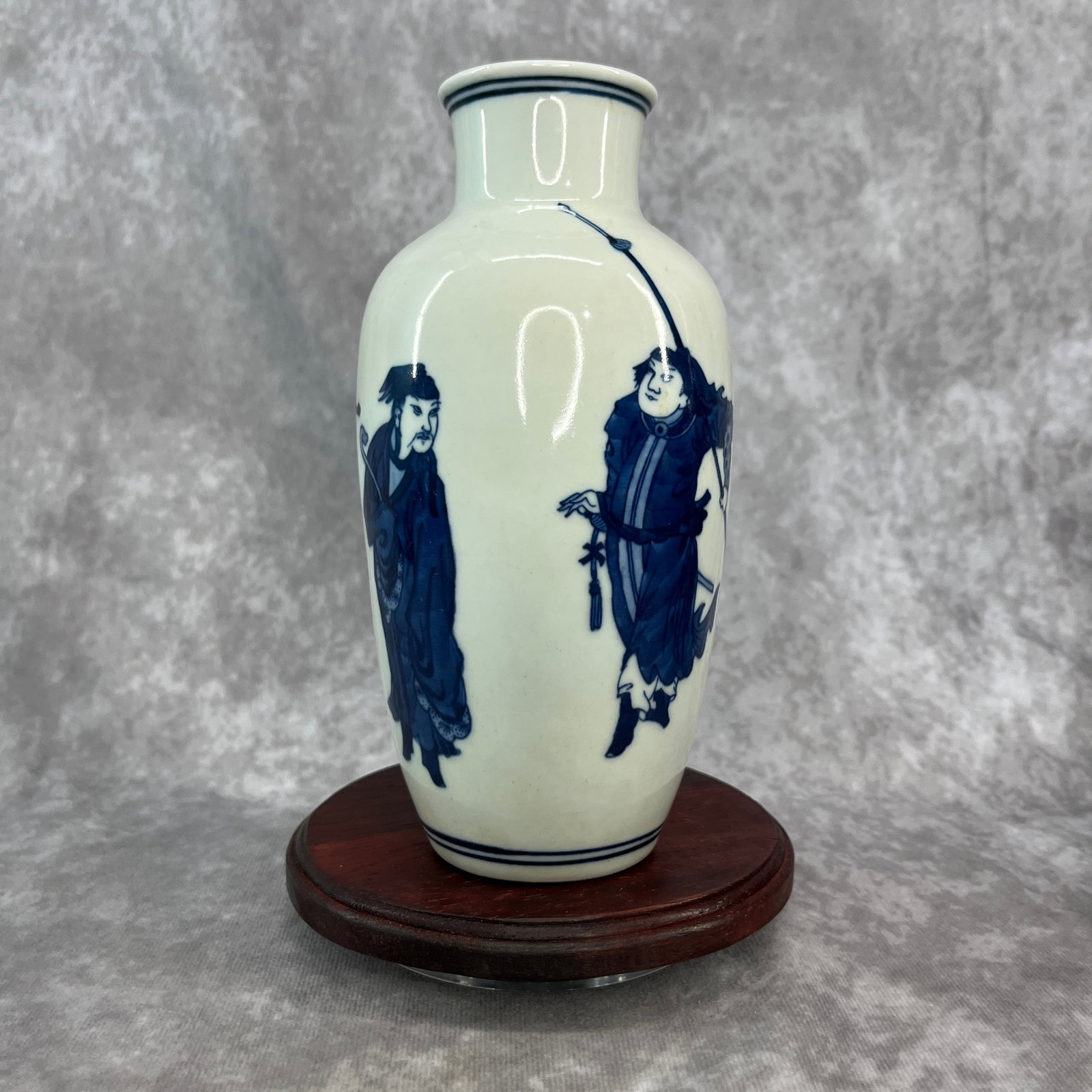 UNDERGLAZE BLUE AND WHITE PORCELAIN VASE: Republic Period; High: 7.3 inch; Diameter: 3.6 inch; . Wooden base for display only