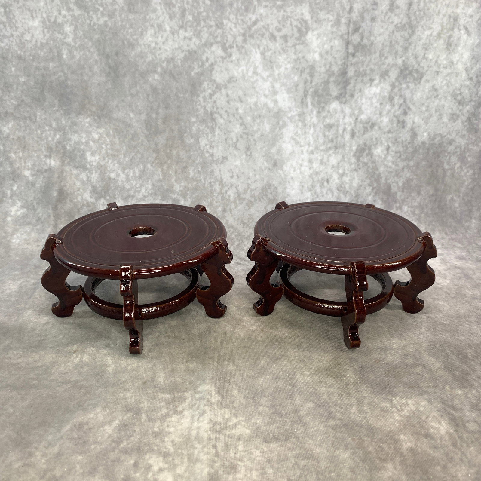 PAIR OF ROUND FIVE-LEGGED HARDWOOD WOODEN STANDS: Modern; High: 3.3 inch; Diameter: 7.2 inch; . Wooden base for display only