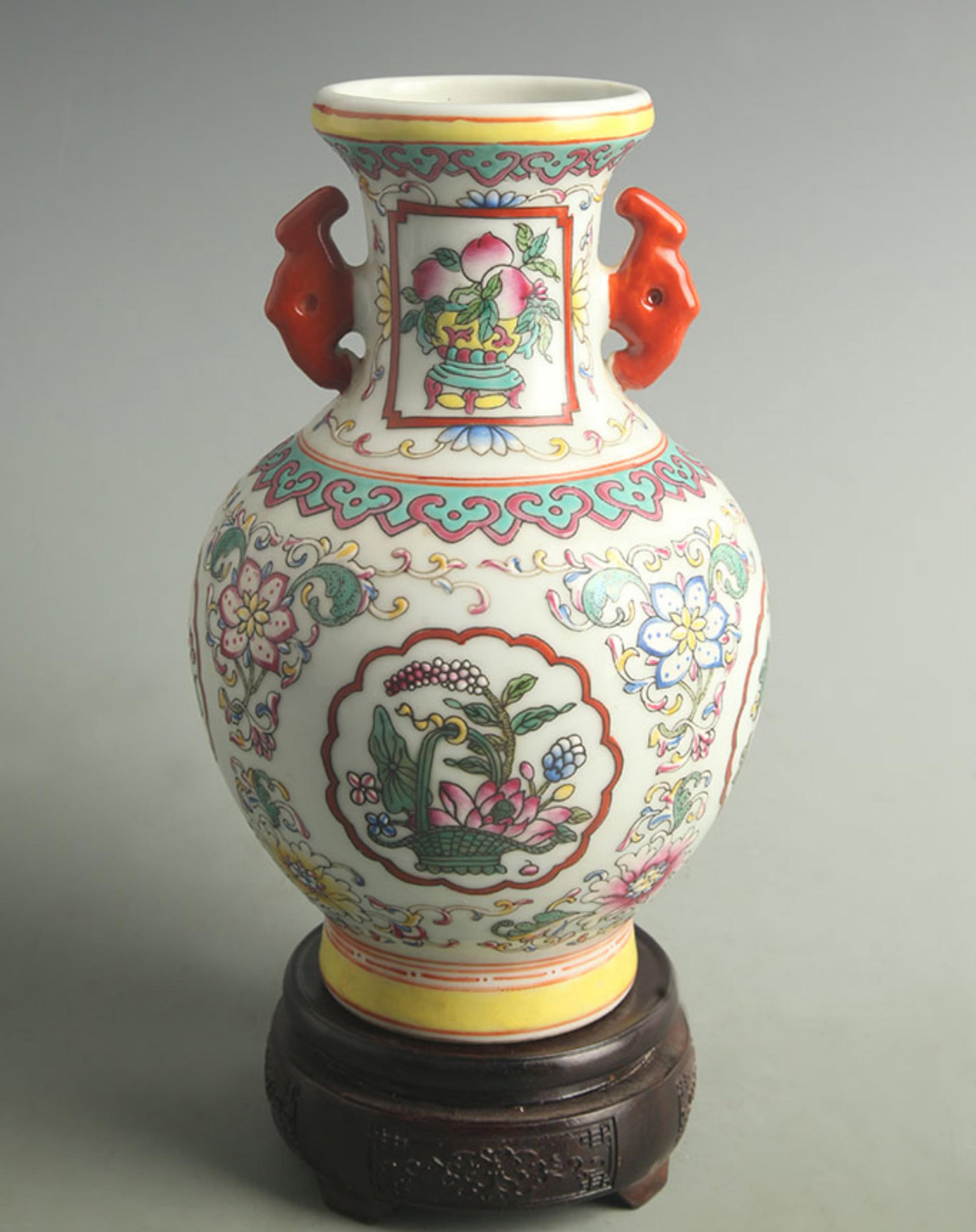 FAMILLE CLOISONNE ENAMEL FLORAL PATTERN DOUBLE-EARED VASE: Qing Dynasty Qian Long Period; High: 9.50 inch; Width: 5.50 inch; . Wooden base for display only