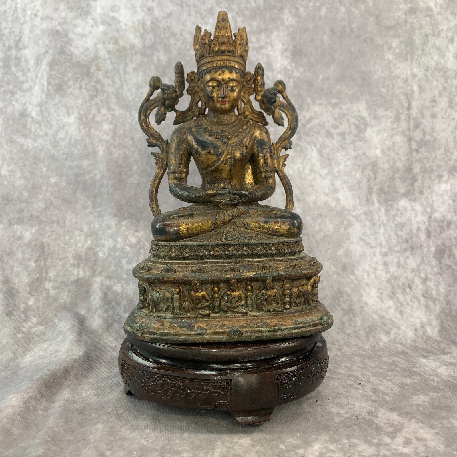 TIBETAN PARTIAL-GILT BRONZE FIGURE OF AMITAYUS: Qing Dynasty; Long: 6.4 inch; Width: 5 inch; High: 9.8 inch; . Wooden base for display only