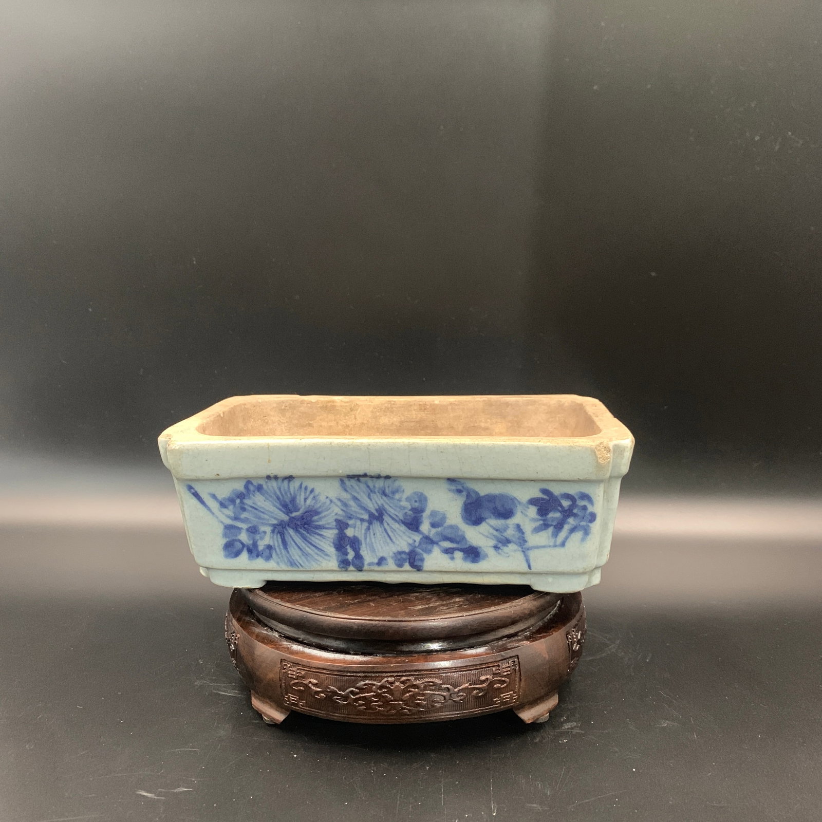BLUE AND WHITE RECTANGULAR BONSAI PORCELAIN PLANTER: Qing Dynasty; Long: 7.8 inch; Width: 5 inch; High: 2.6 inch;. Wooden base for display only