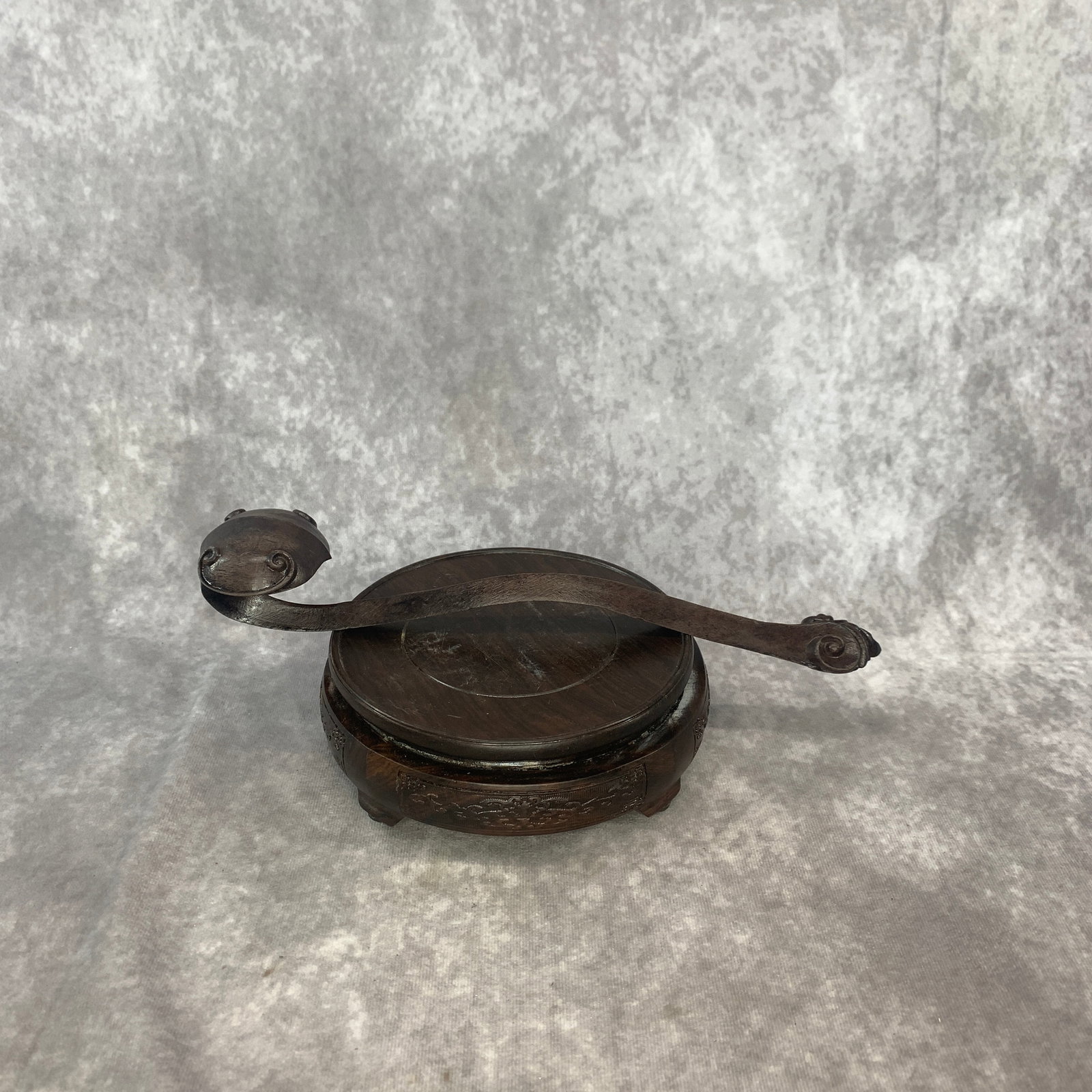 A FINE DARK HARDWOOD RUYI SCEPTER: Modern; Long: 11.5 inch; High: 2 inch; . Wooden base for display only