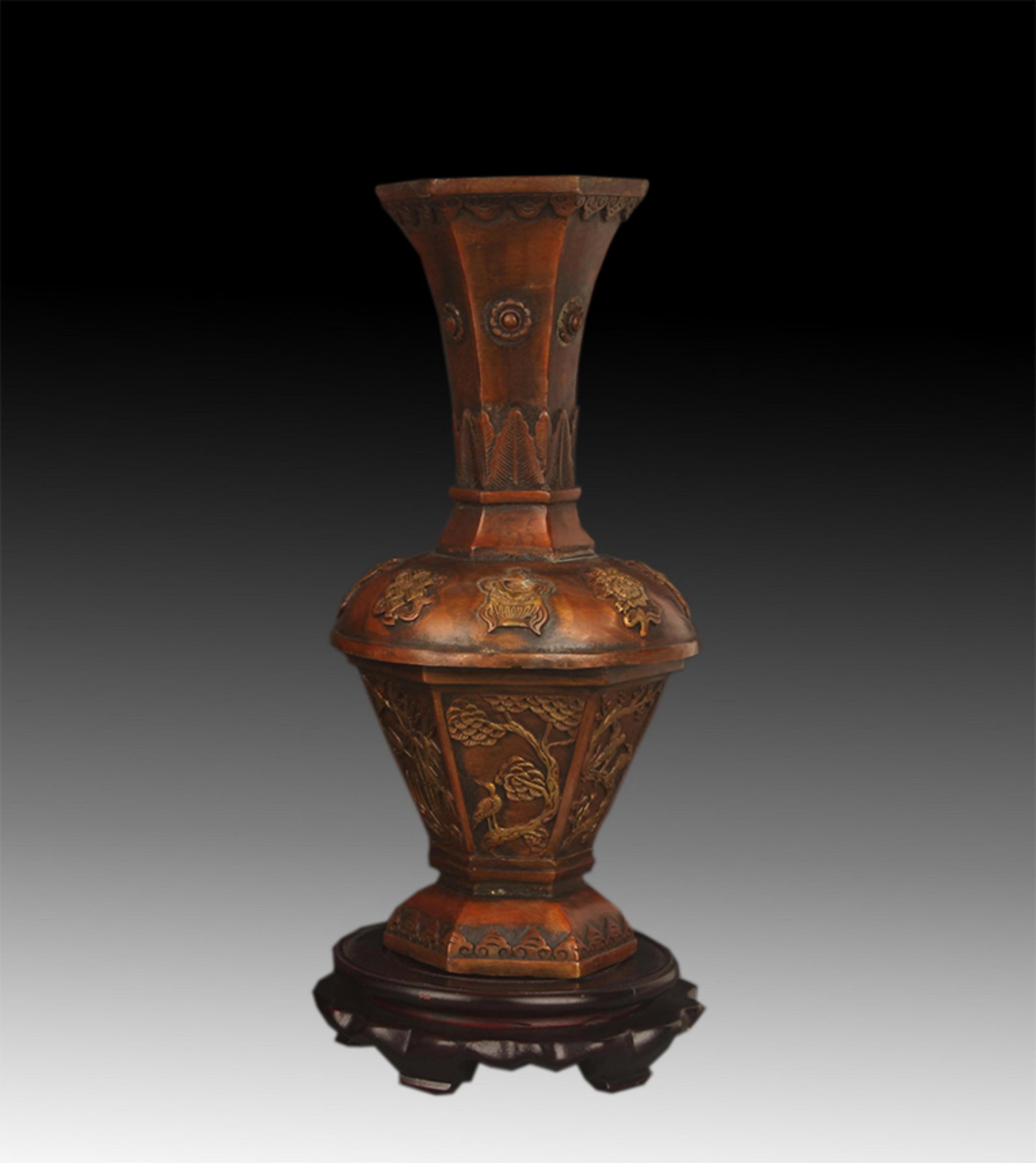 A FINE BRONZE HEXAGONAL VASES WITH AUSPICIOUS EIGHT TREASURES AND FLORAL PATTERNS: 20th Century; High: 11.25 inch; Diameter: 3.75 inch; . Wooden base for display only