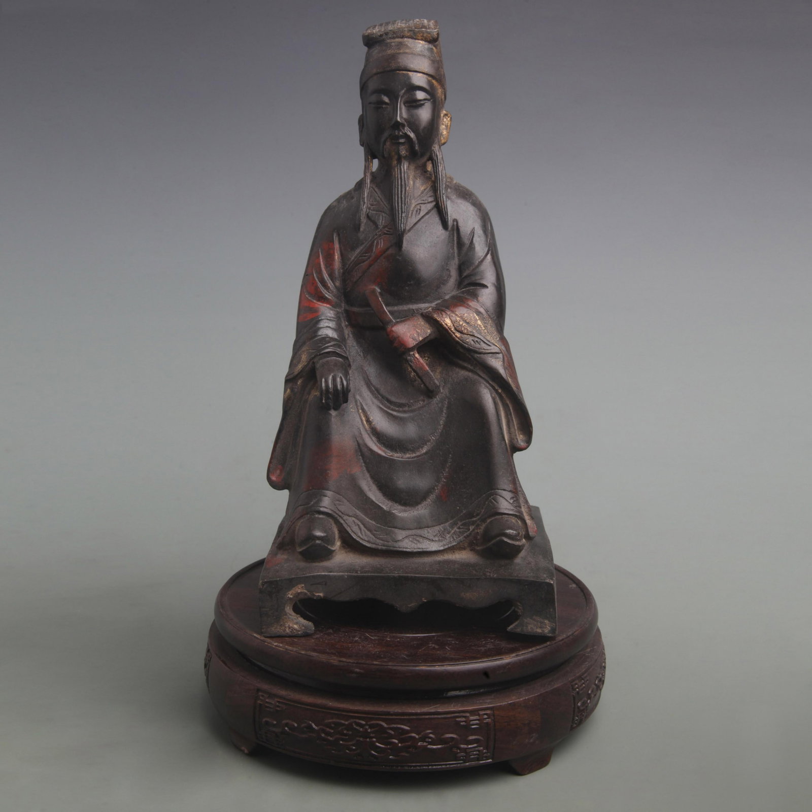BRONZE FIGURE OF THE CIVIL WEALTH DEITY: Qing Dynasty; High: 9.4 inch; Width: 4.6 inch; . Wooden base for display only