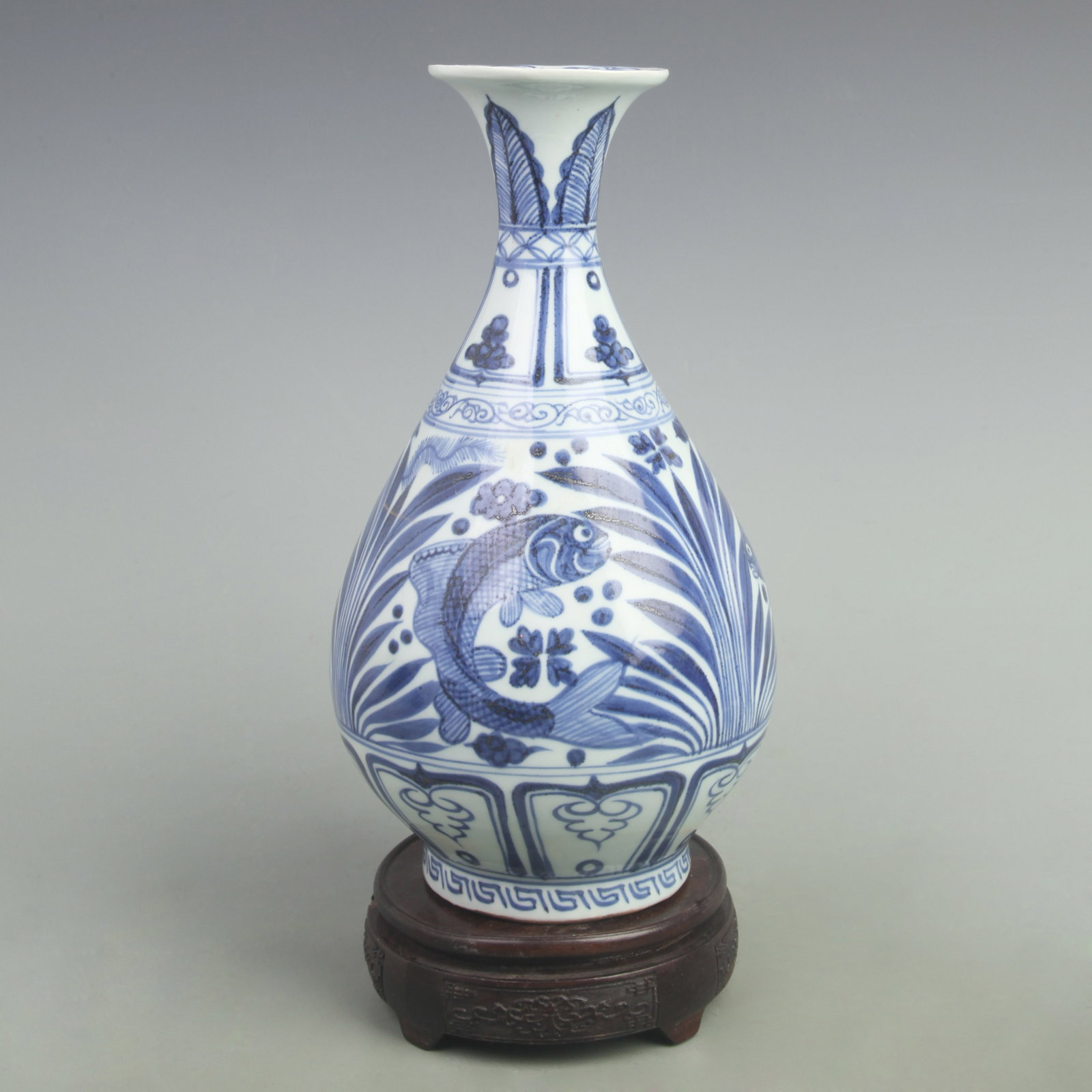 BLUE AND WHITE FISH PATTERN YU HU CHUN VASE: Yuan Dynasty; High: 12 inch; Width: 6.5 inch; . Wooden base for display only