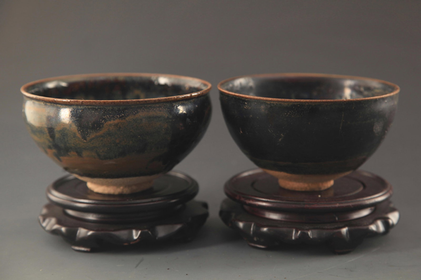 PAIR OF JIAN KILN GLAZED PORCELAIN CUP: Song Dynasty Style; High: 11.75 inch; Diameter: 4.25 inch; . Wooden base for display only