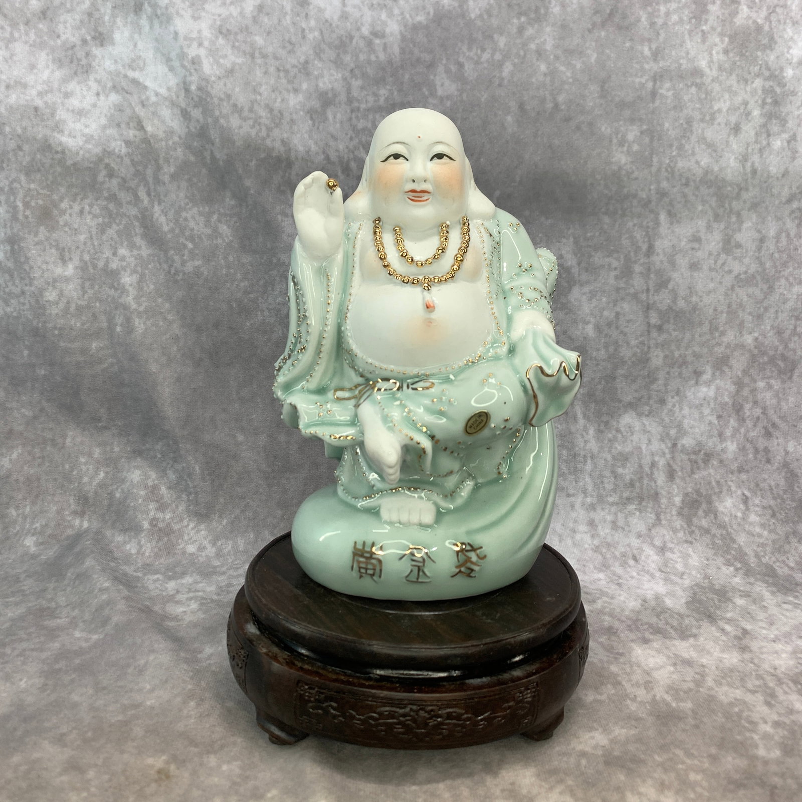 CELADON-TINTED LAUGHING BUDDHA STATUE: Republic Period; Long: 5.3 inch; Width: 4.1 inch; High: 8.1 inch; . Wooden base for display only
