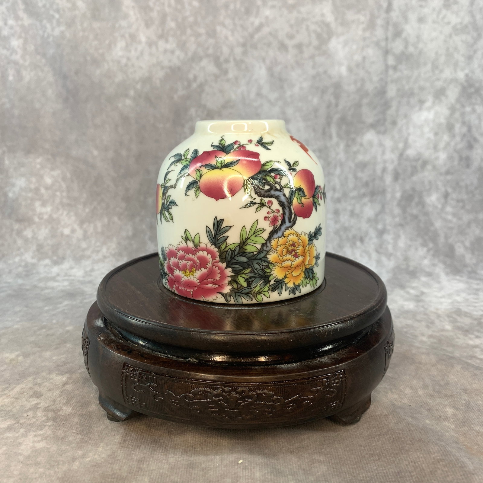 FAMILLE ROSE "NINE PEACHES" WATER COUPE: Qing Dynasty; High: 3.4 inch; Diameter: 3.6 inch; . Wooden base for display only